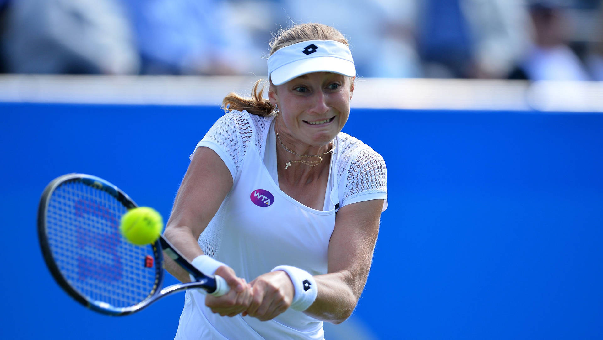 Caption: Ekaterina Makarova In Action During A Tennis Match Background