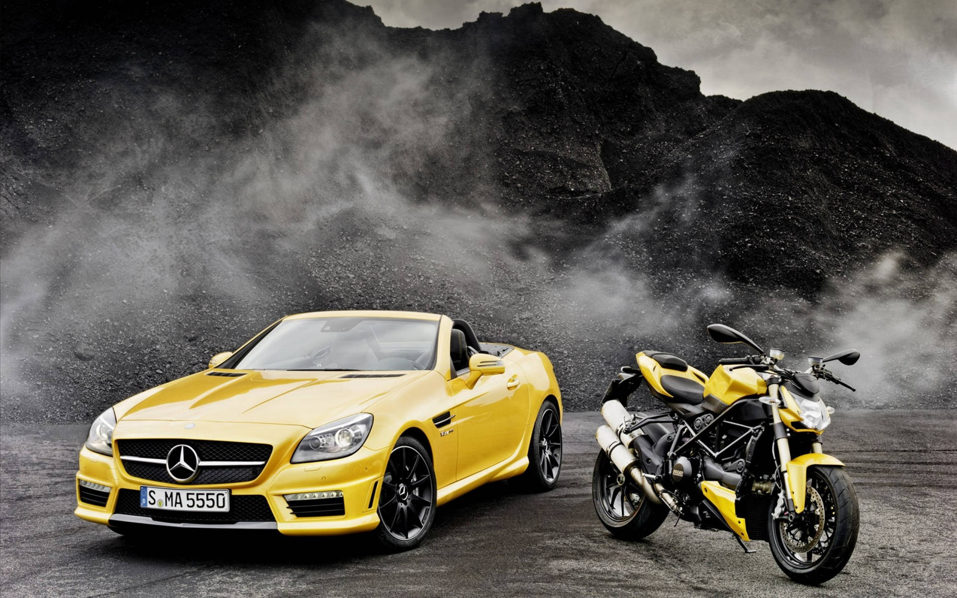 Caption: Elegance In Motion: Yellow Convertible Luxury Car Background
