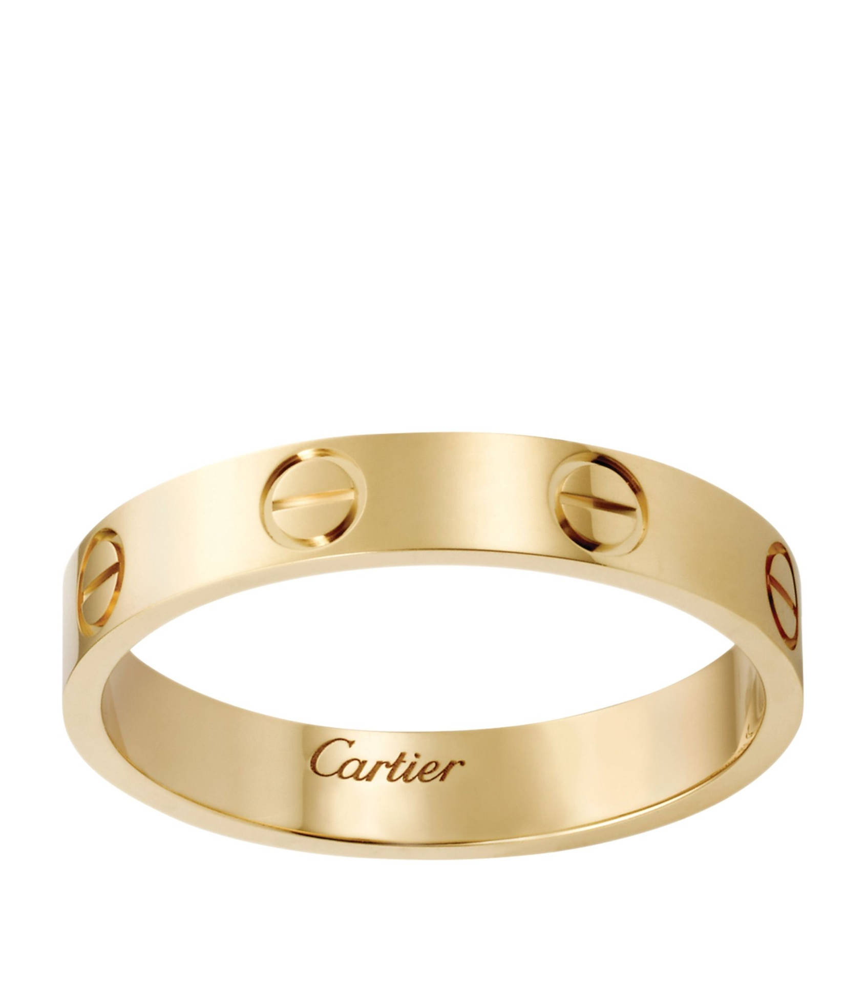 Caption: Elegance Personified - The Cartier Gold Ring