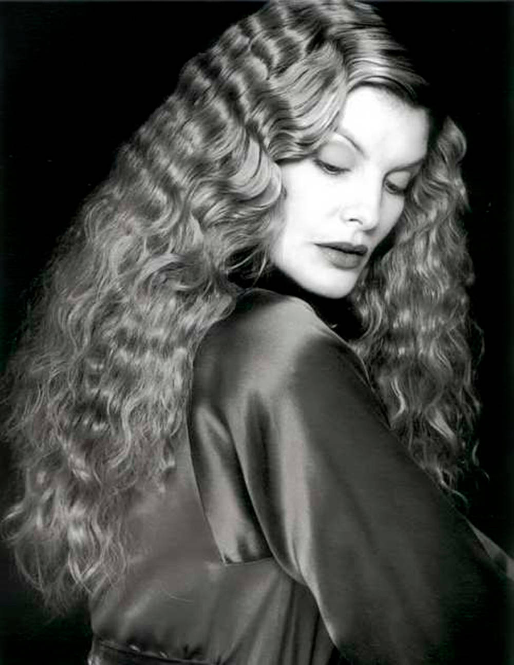 Caption: Elegant American Actress, Rene Russo, In Portrait Photography Background