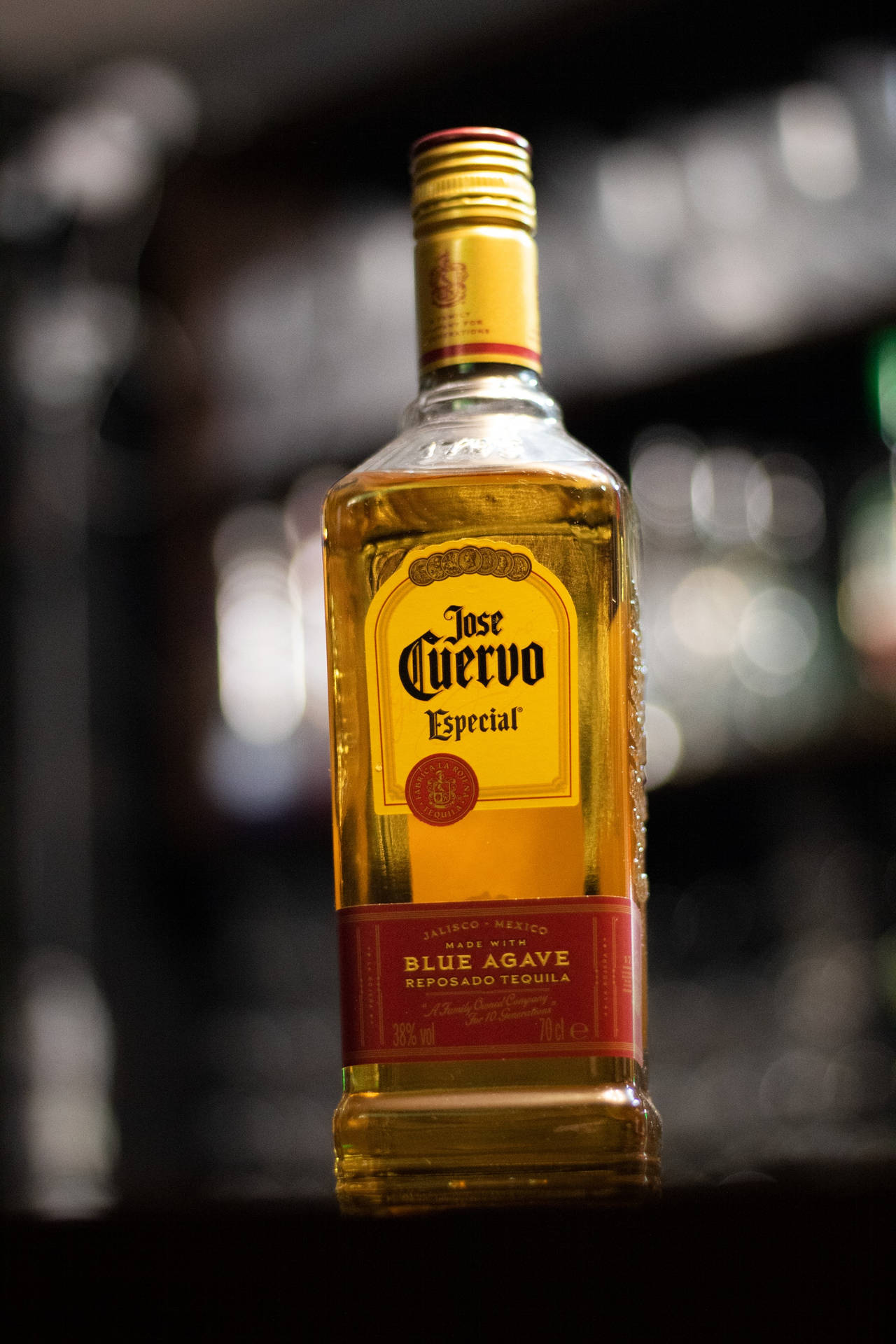 Caption: Elegant Jose Cuervo Agave Tequila Bottle Background