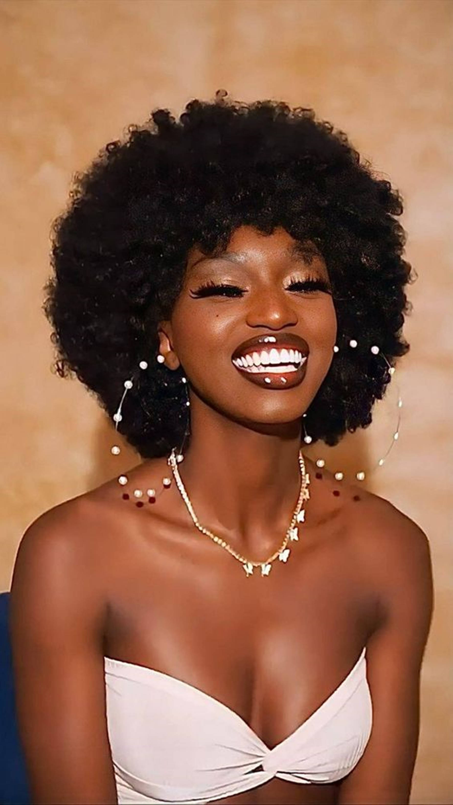 Caption: Elegant Radiance: Beautiful Black Woman Rocking Pearl Hoops