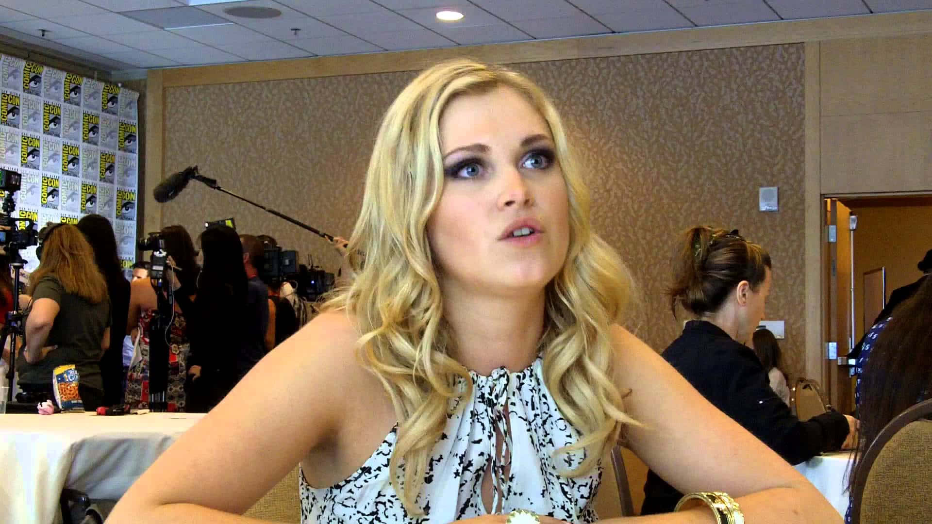 Caption: Eliza Taylor Radiates In Her Elegant Ensemble.