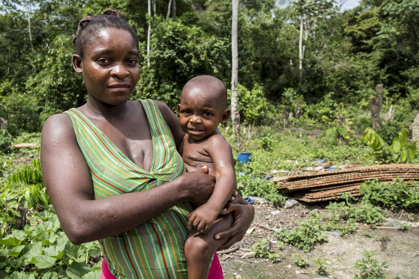 Caption: Embracing Maternal Love, Gabon Background