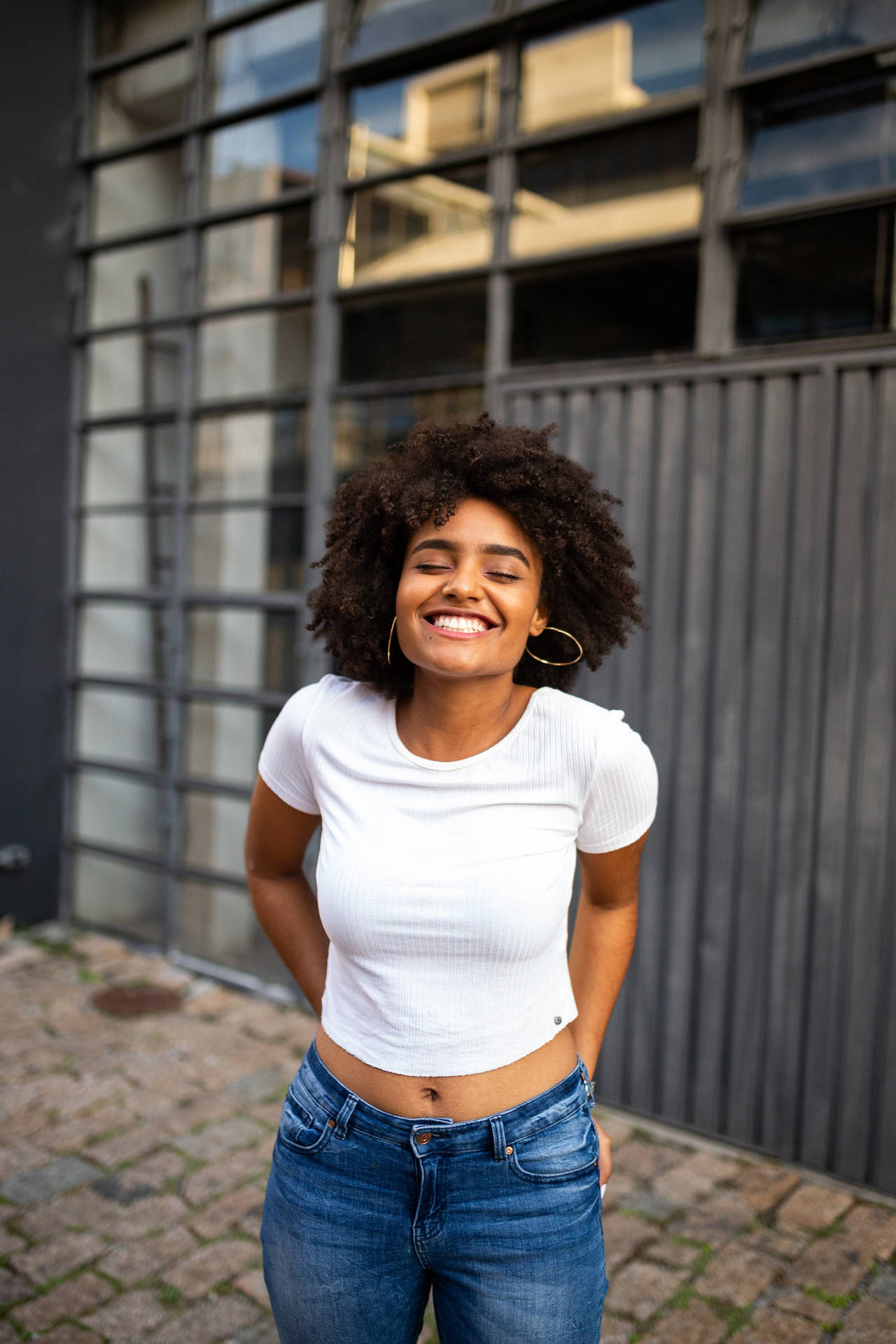 Caption: Empowered Elegance - A Black Woman In A Crisp White Shirt