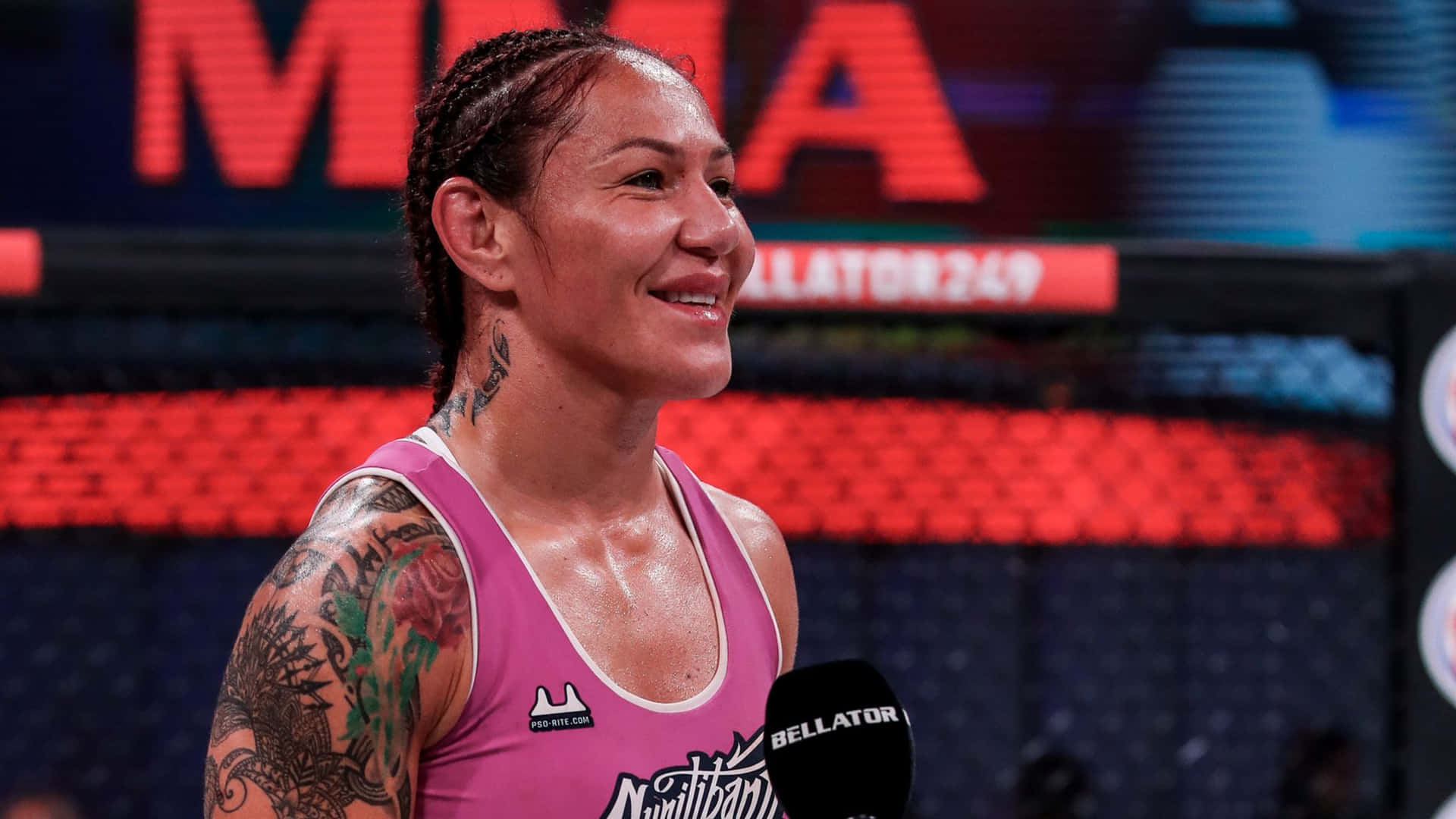 Caption: Empowering Smile Of Cris Cyborg, The American Ufc Athlete Background