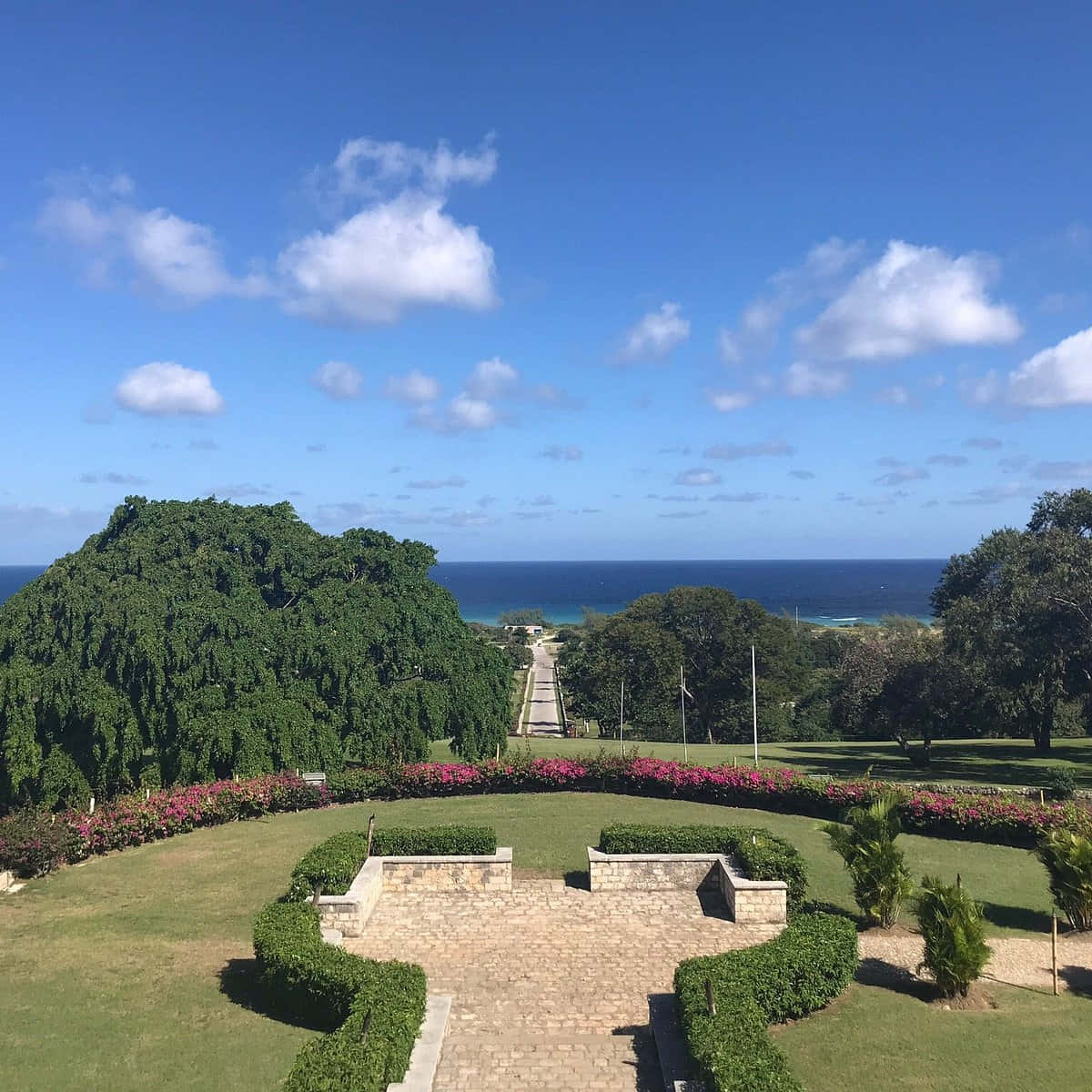 Caption: Enchanting View Of Rose Hall Great House Overlooking The Ocean Background