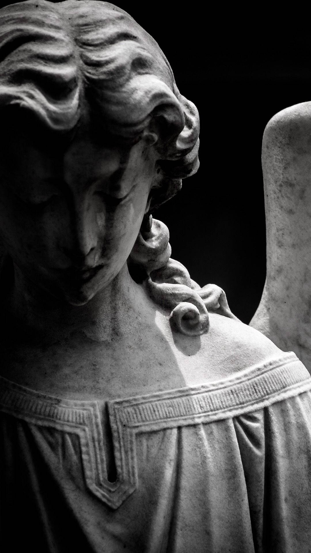 Caption: Enchantment In Stone - The Timeless Beauty Of A Greek Statue Background