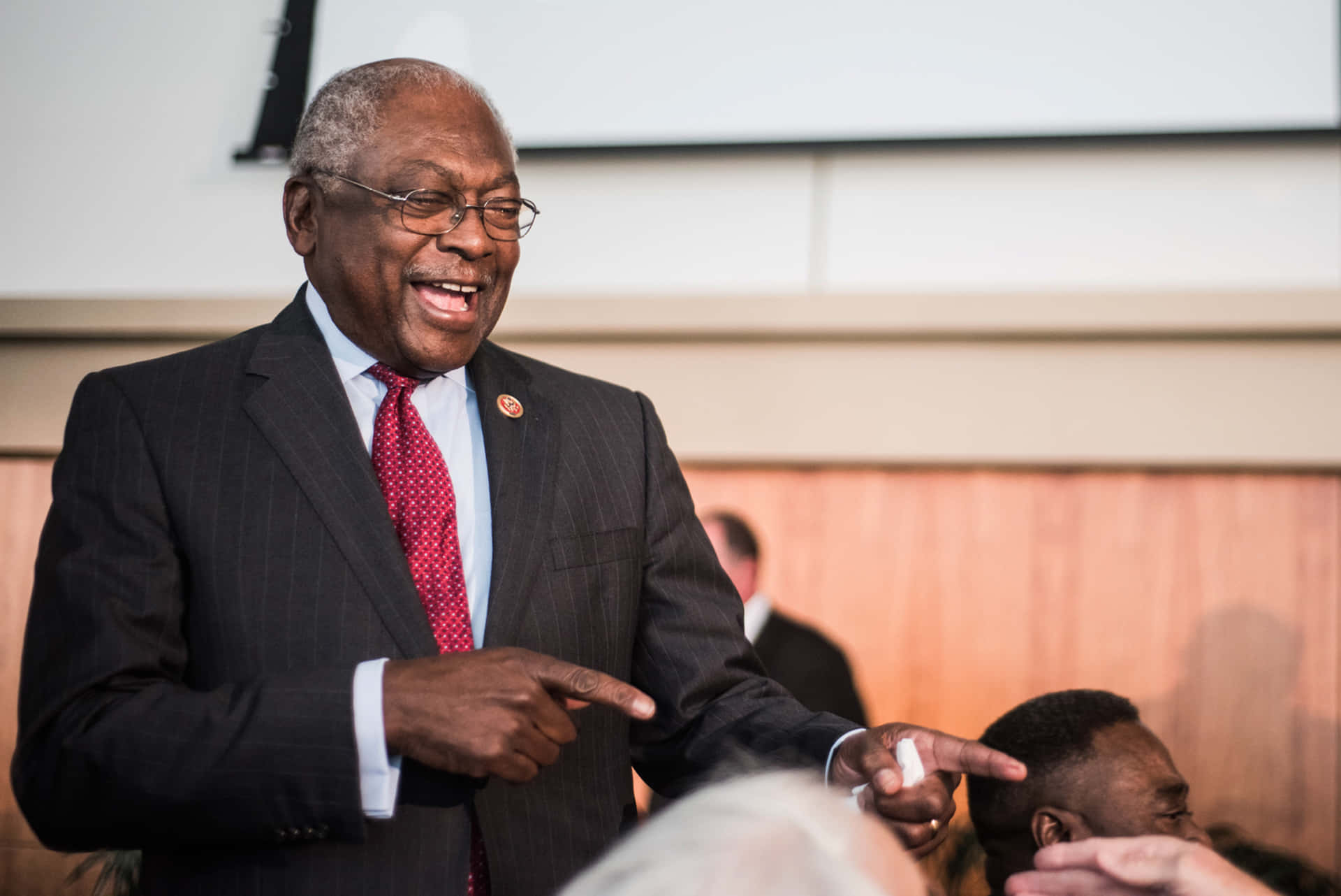 Caption: Engaging Moment Of Jim Clyburn Laughing And Pointing