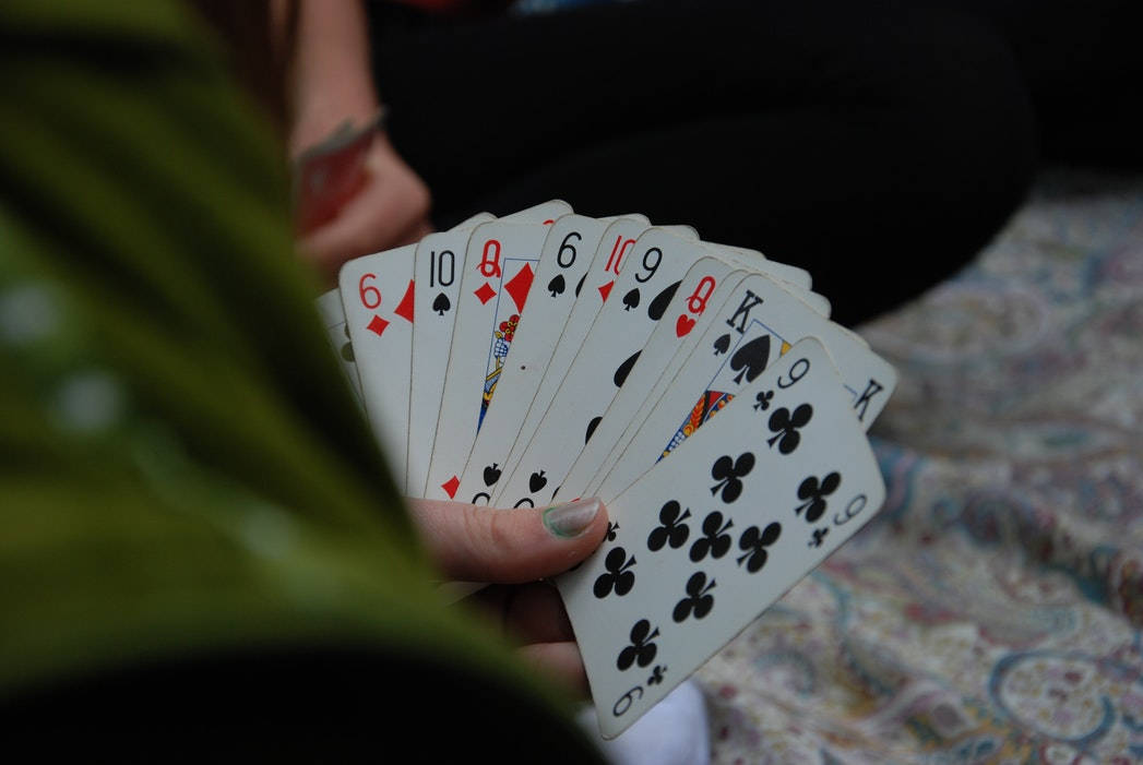 Caption: Euchre Player's Hand With Deck