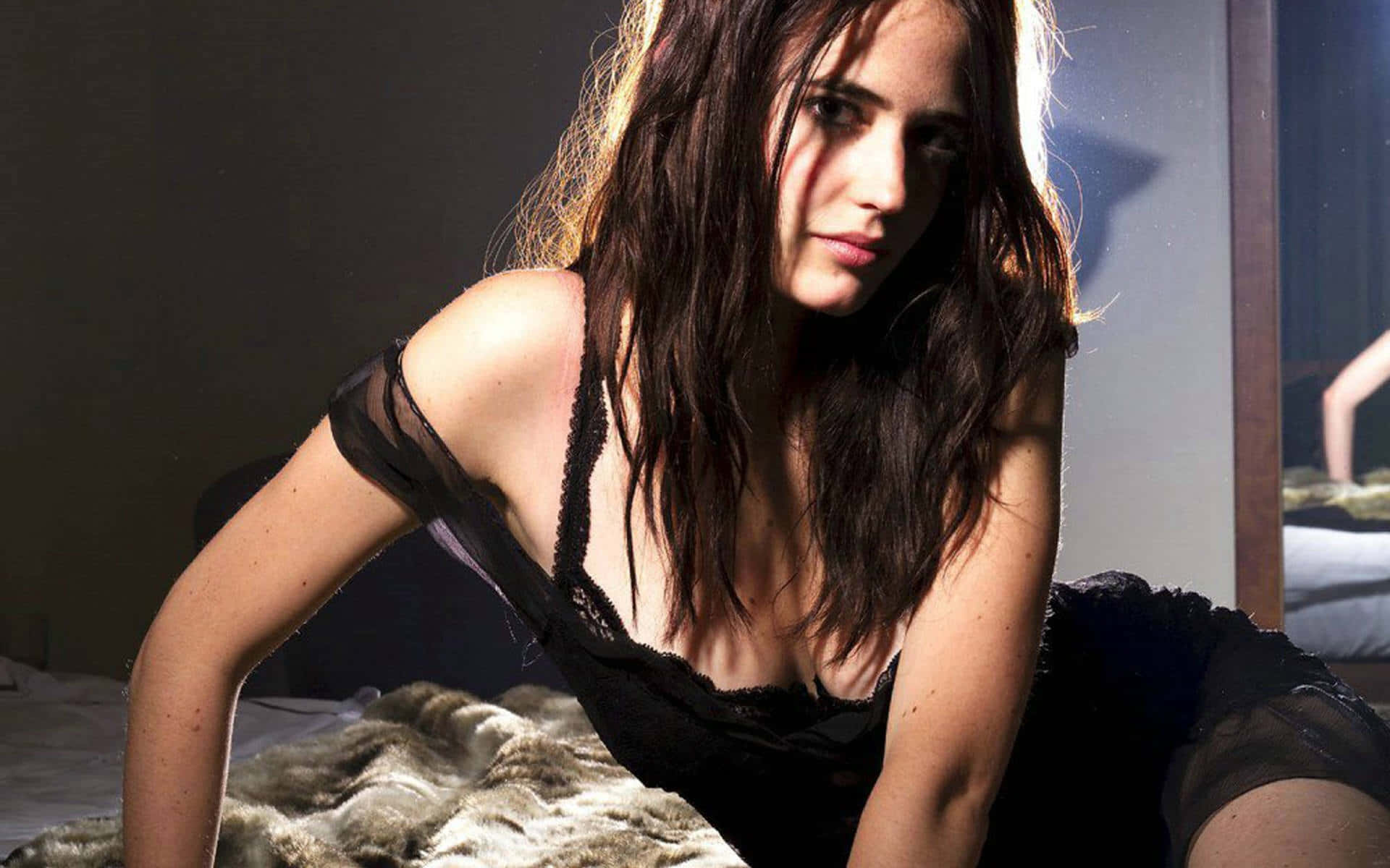 Caption: Eva Green Captivating In A Black Dress Background