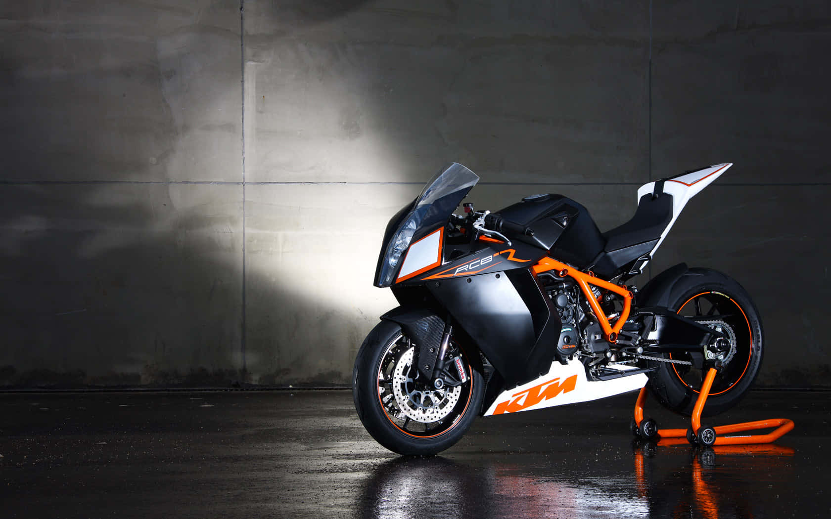 Caption: Exhilarating Ride - Ktm Adventure Motorcycle On An Open Road Background