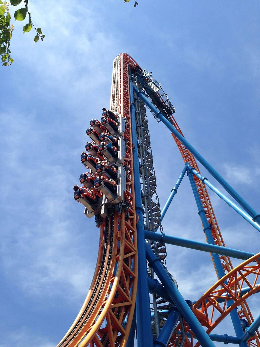 Caption: Exhilarating Rush - World's Steepest Roller Coaster Ride Background