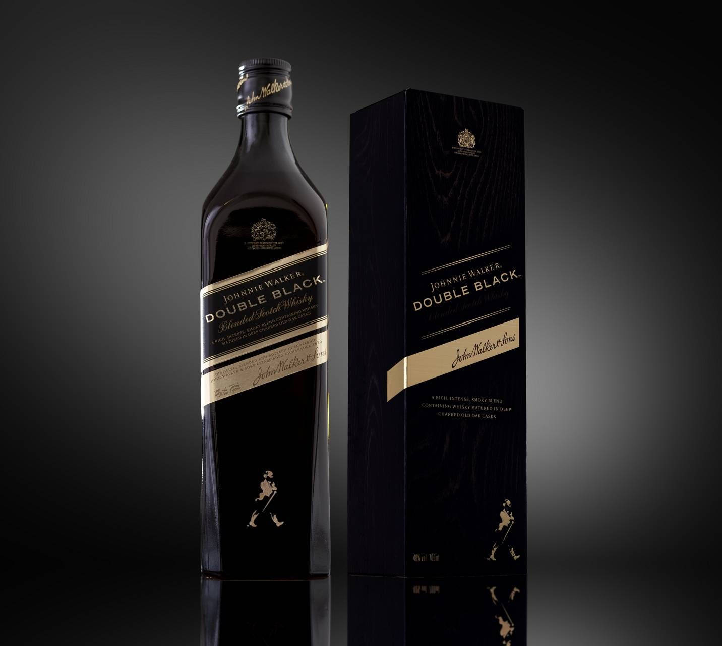 Caption: Exquisite Bottle Of Johnnie Walker Double Black Scotch Whisky Background