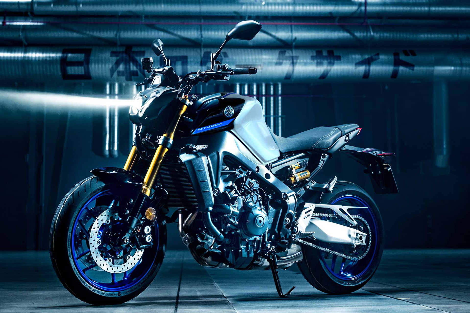 Caption: Exquisite Yamaha Motorcycle In Action Background