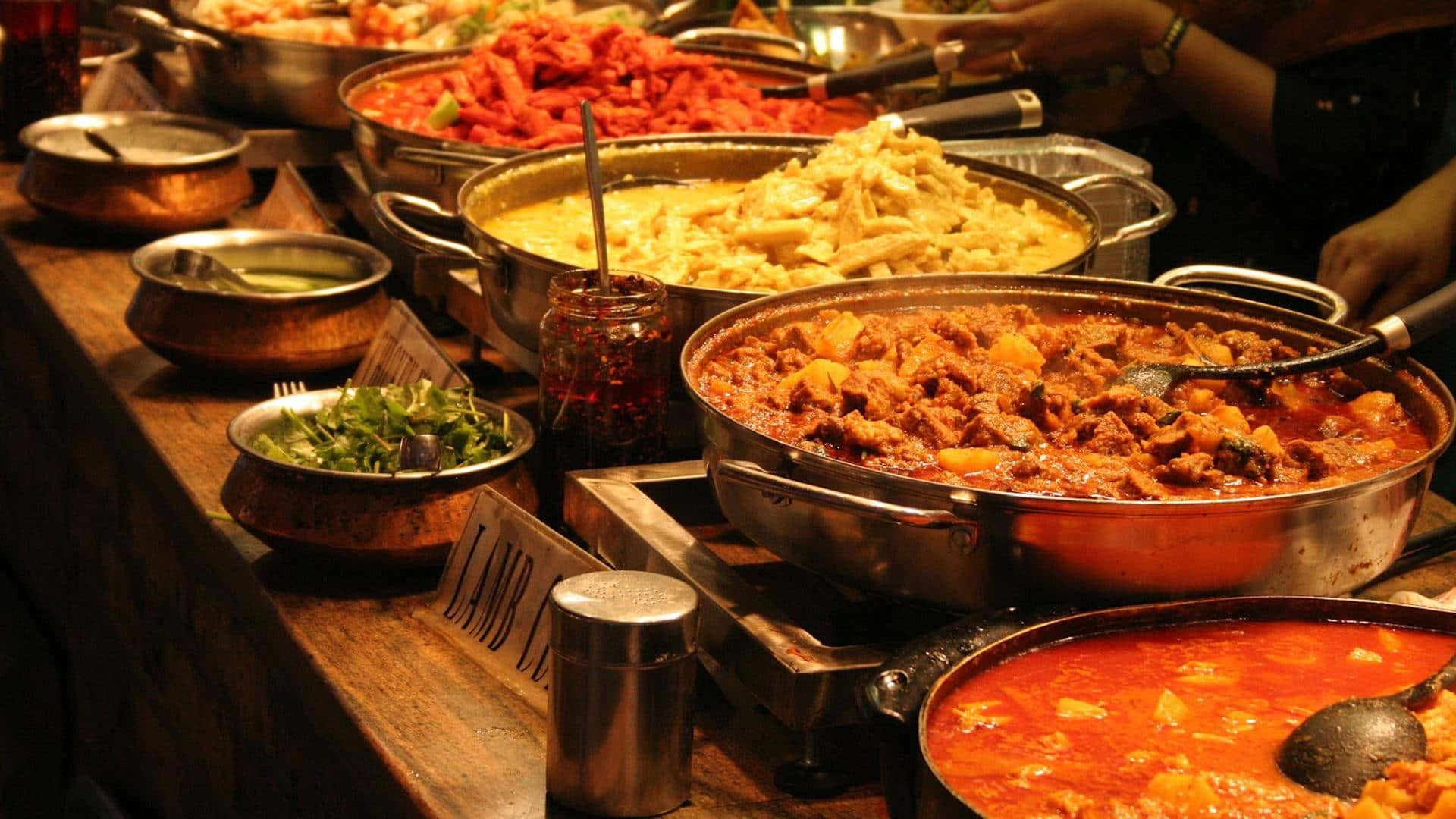 Caption: Extravagant Feast Of Indian Cuisine Background