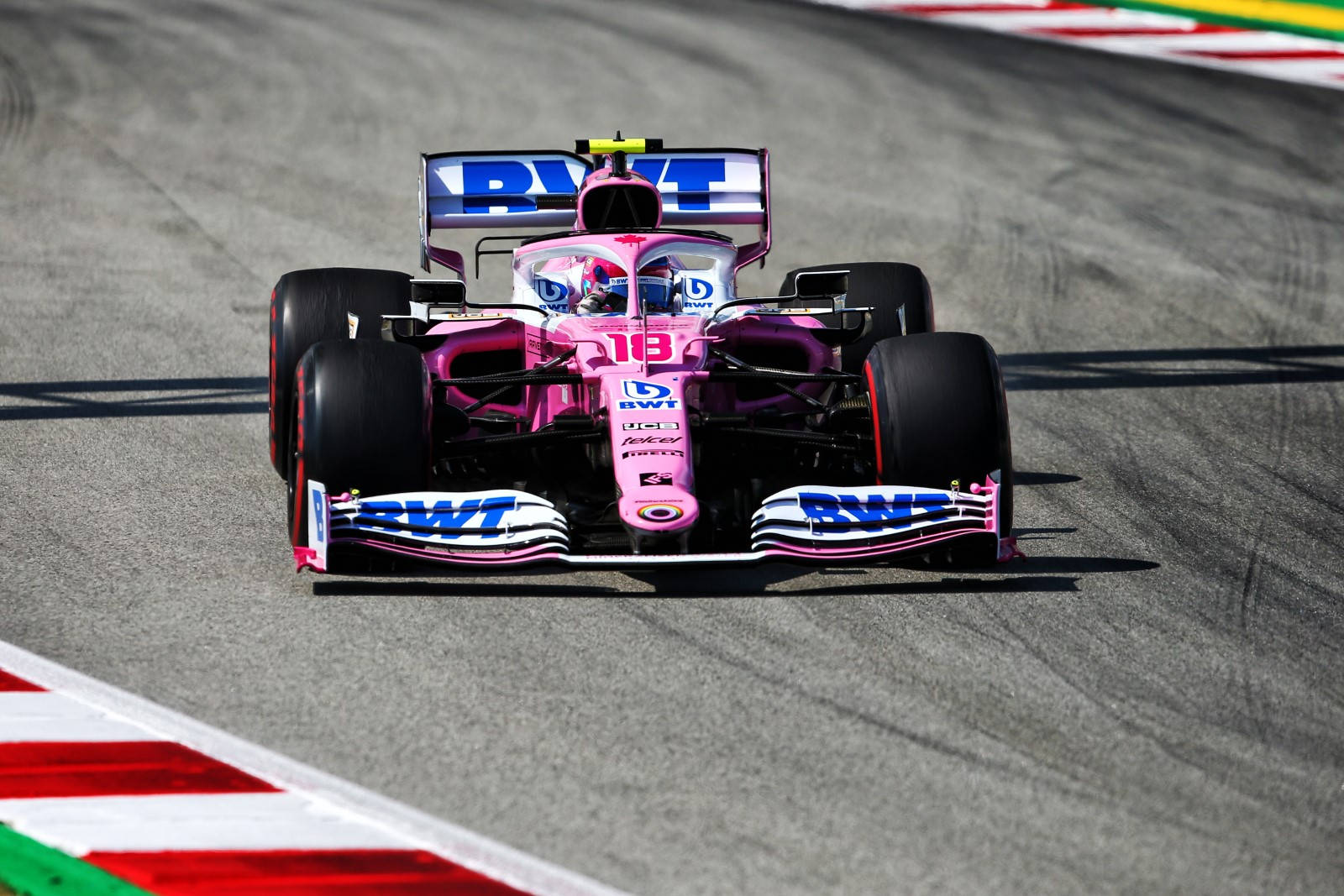 Caption: F1 Racer Lance Stroll In Action Background