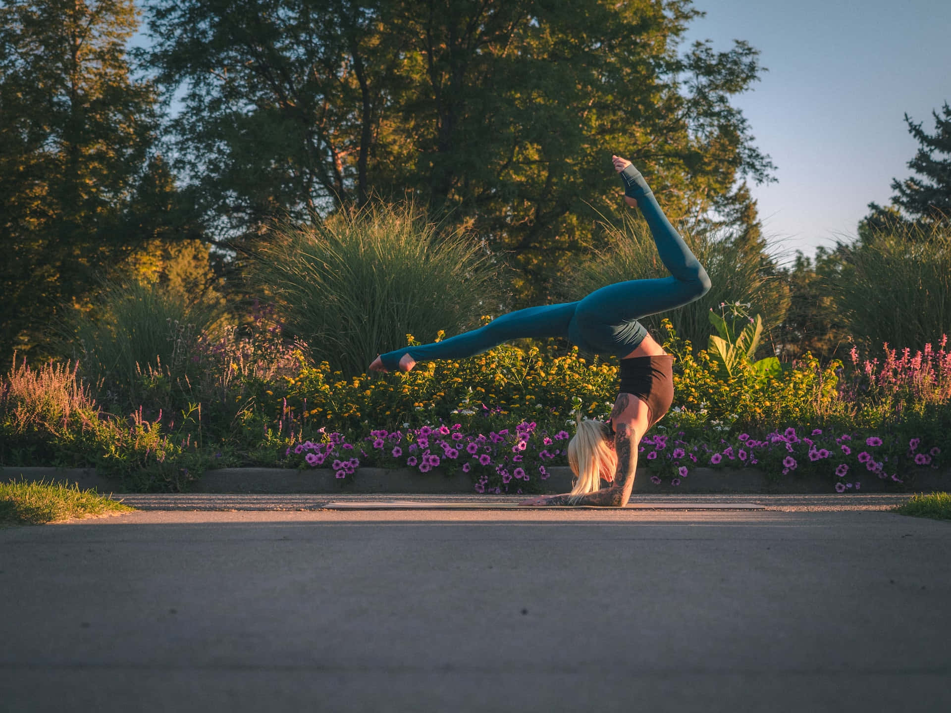 Caption: Fitness Enthusiast Performing A Stretch Exercise Background