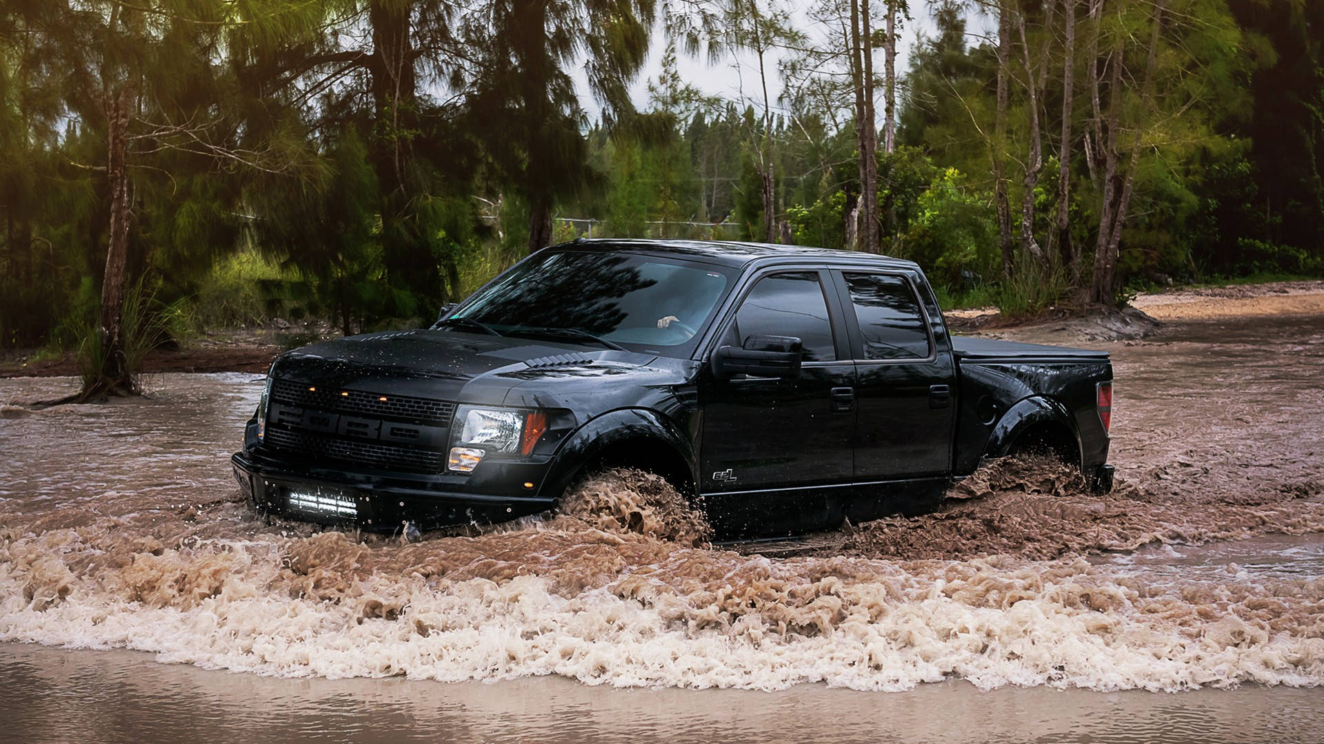 Caption: Ford Raptor Embracing The Flooded Terrain Background
