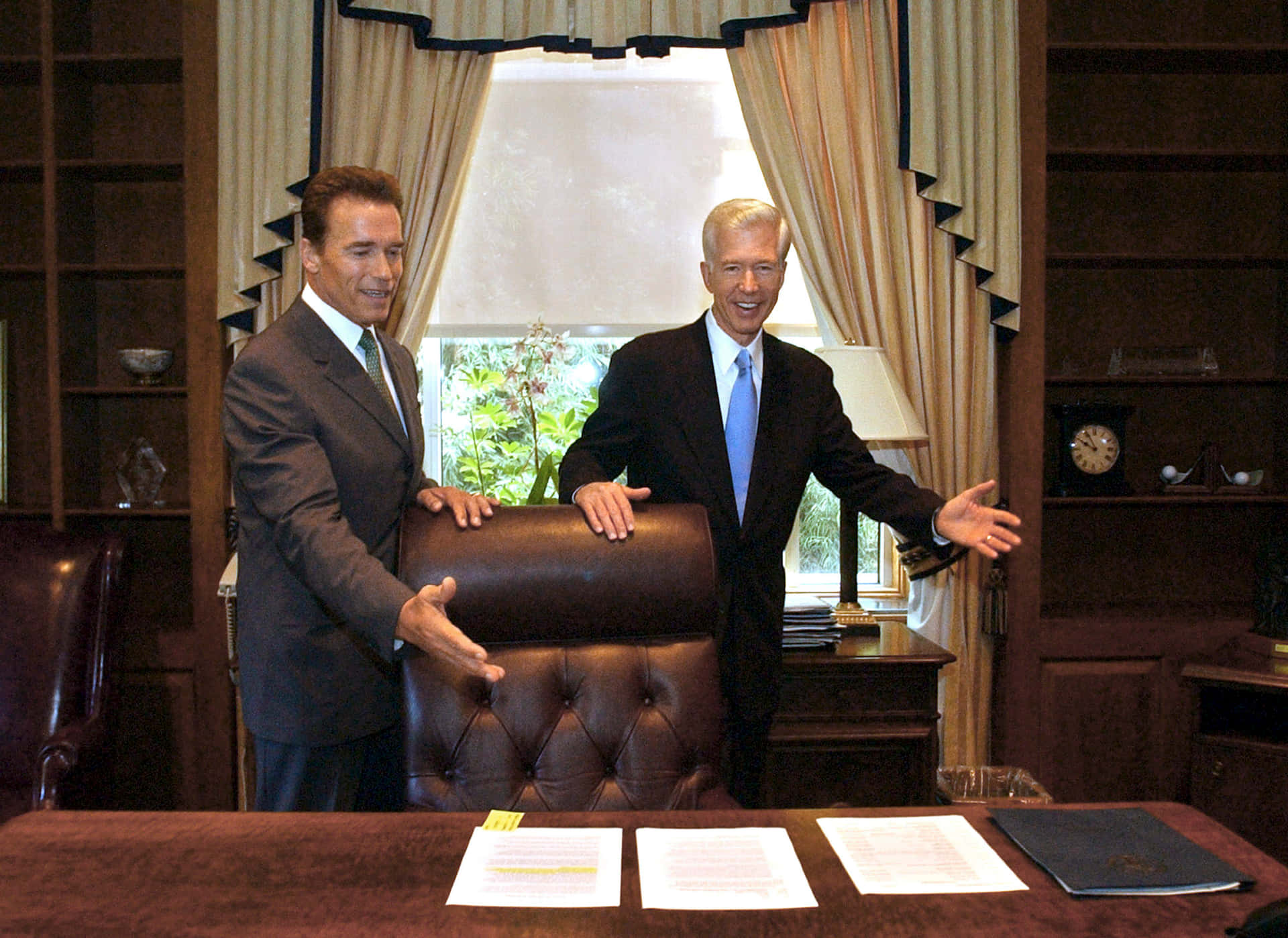 Caption: Former California Governor Gray Davis With Arnold Schwarzenegger