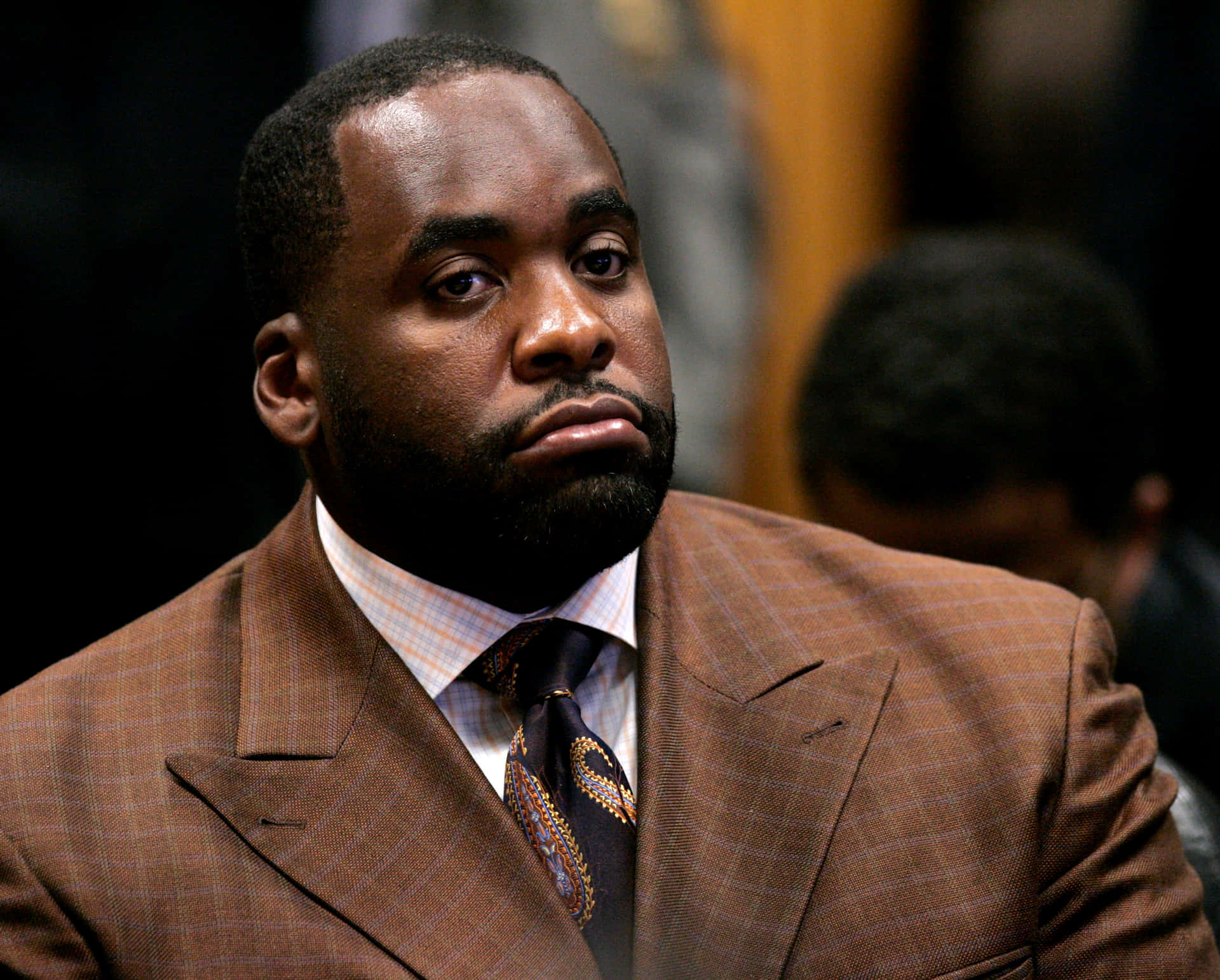 Caption: Former Mayor Kwame Kilpatrick Delivering A Powerful Speech Background