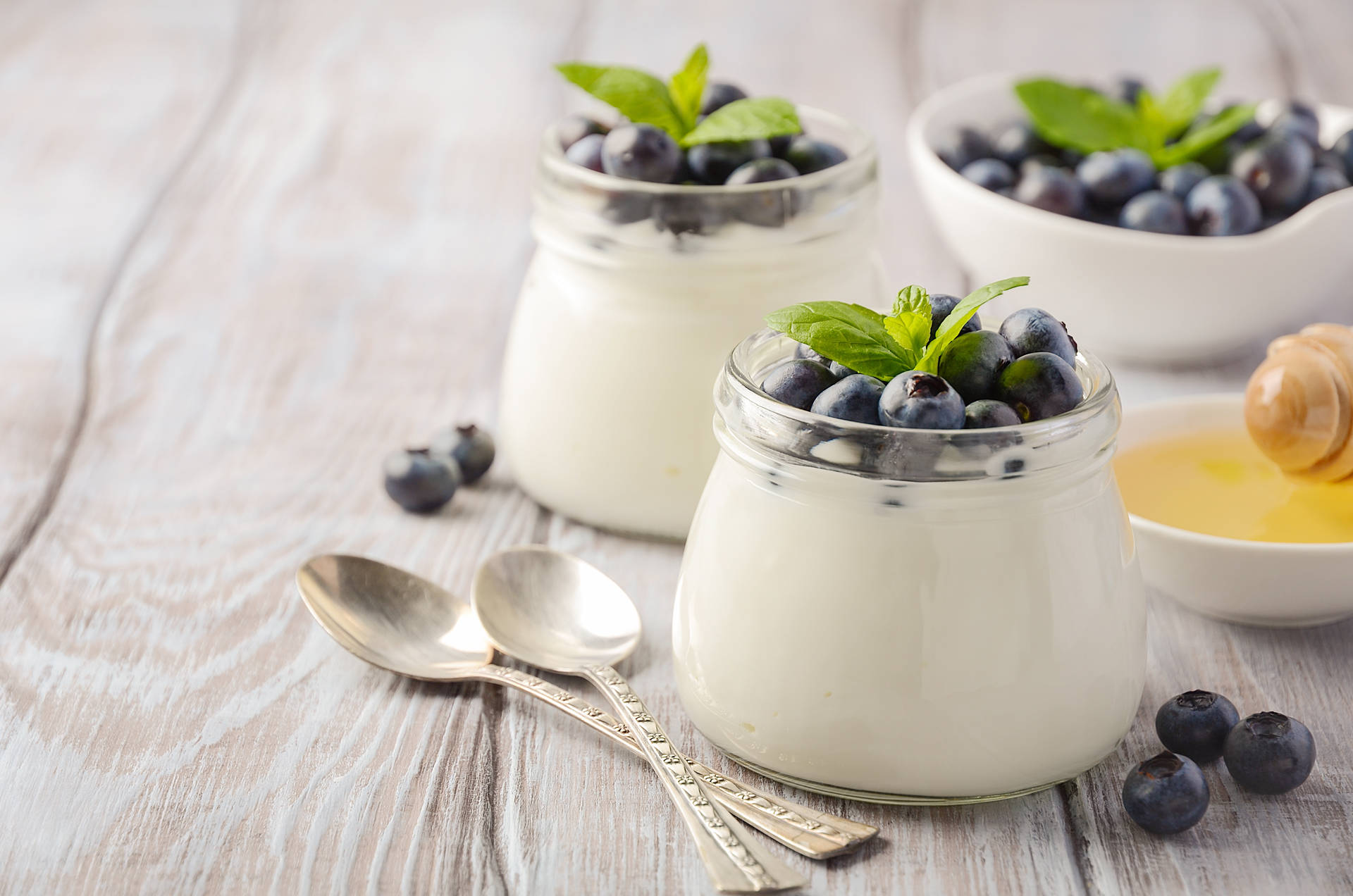 Caption: Fresh Yogurt With Blueberries Background