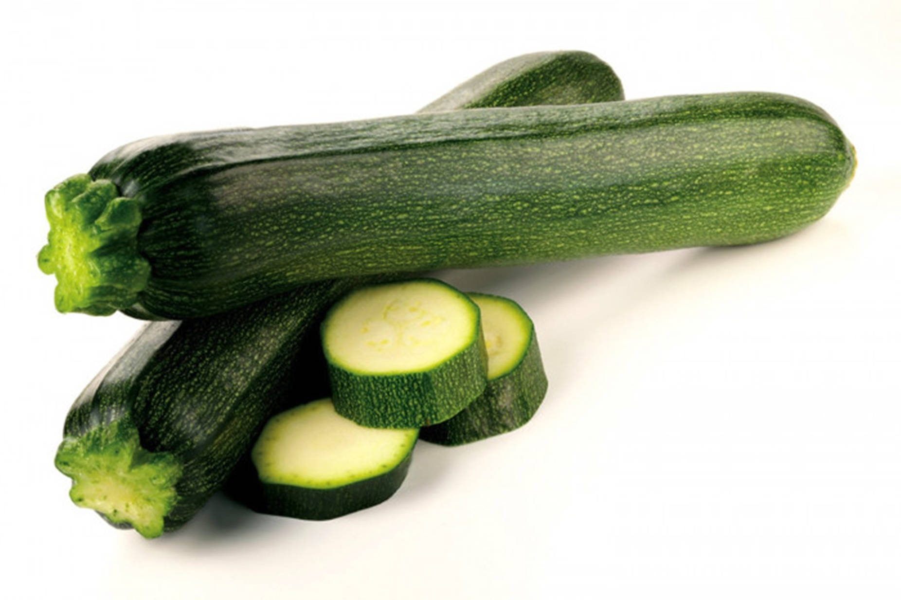 Caption: Fresh Zucchini With Sliced Pieces Close-up