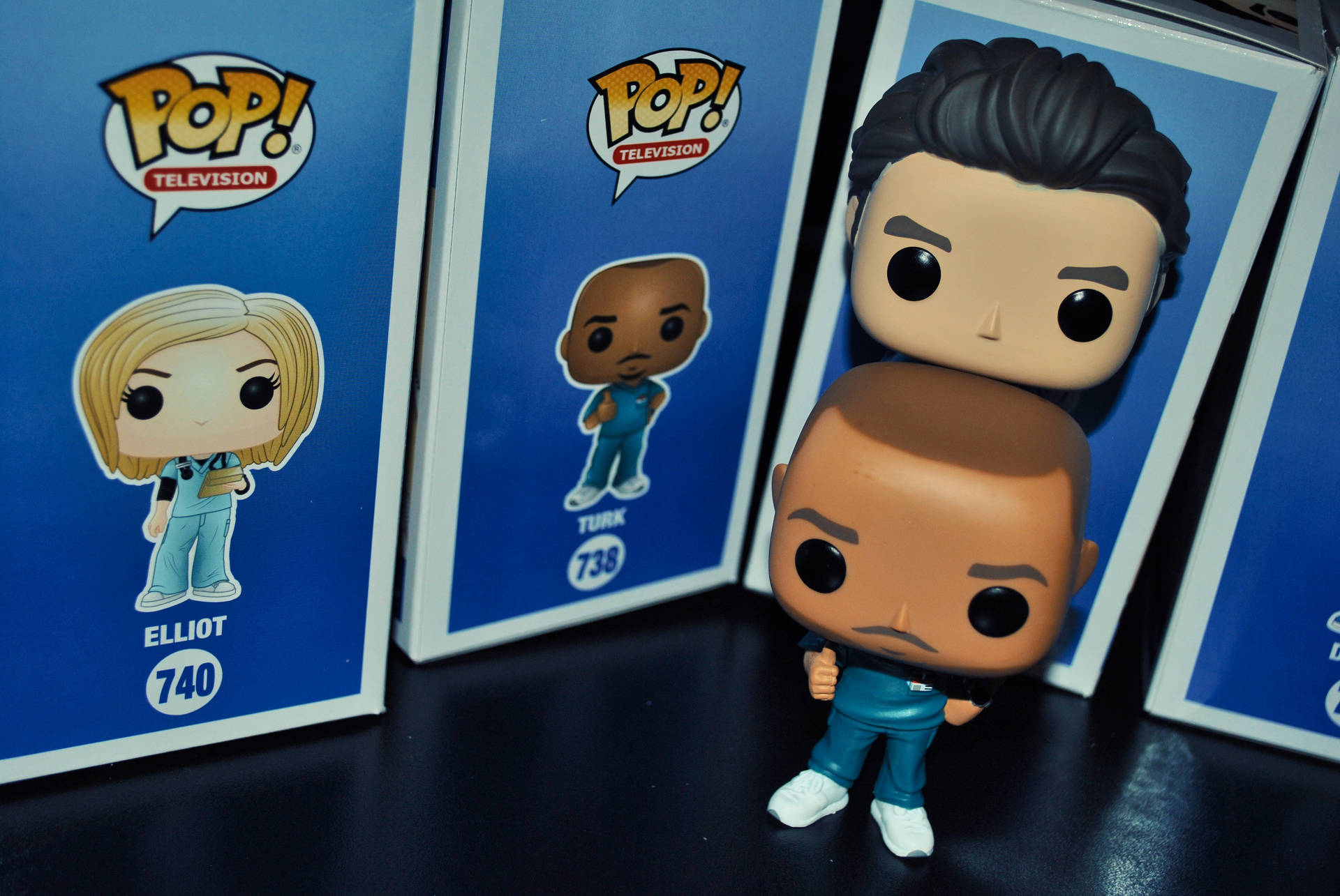 Caption: Funko Pop's Jd And Turk Figurines Inspired By Scrubs Tv Show Background