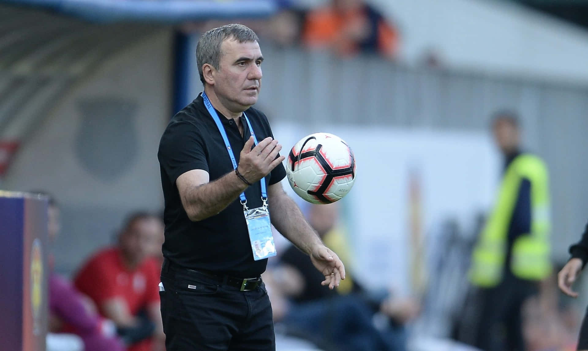 Caption: Gheorghe Hagi Coaching Viitorul Constanta Team At A Match Background