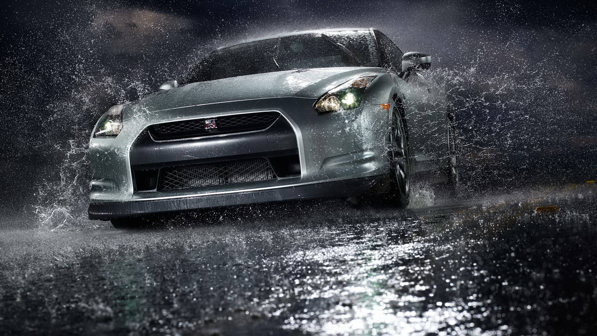 Caption: Gleaming Nissan Skyline Gtr R35 Under The Rain Background