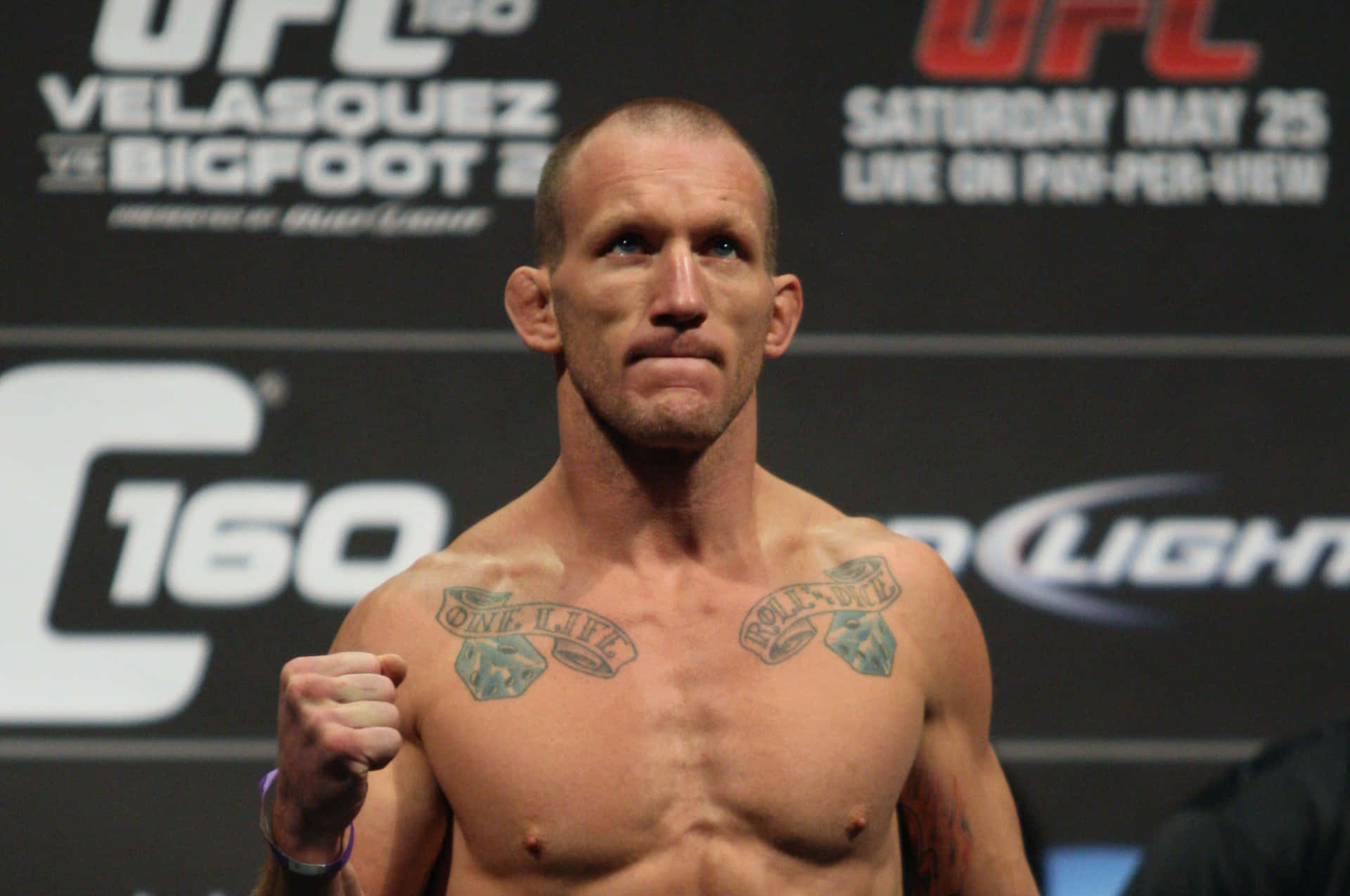 Caption: Gray Maynard In Action Stance Background