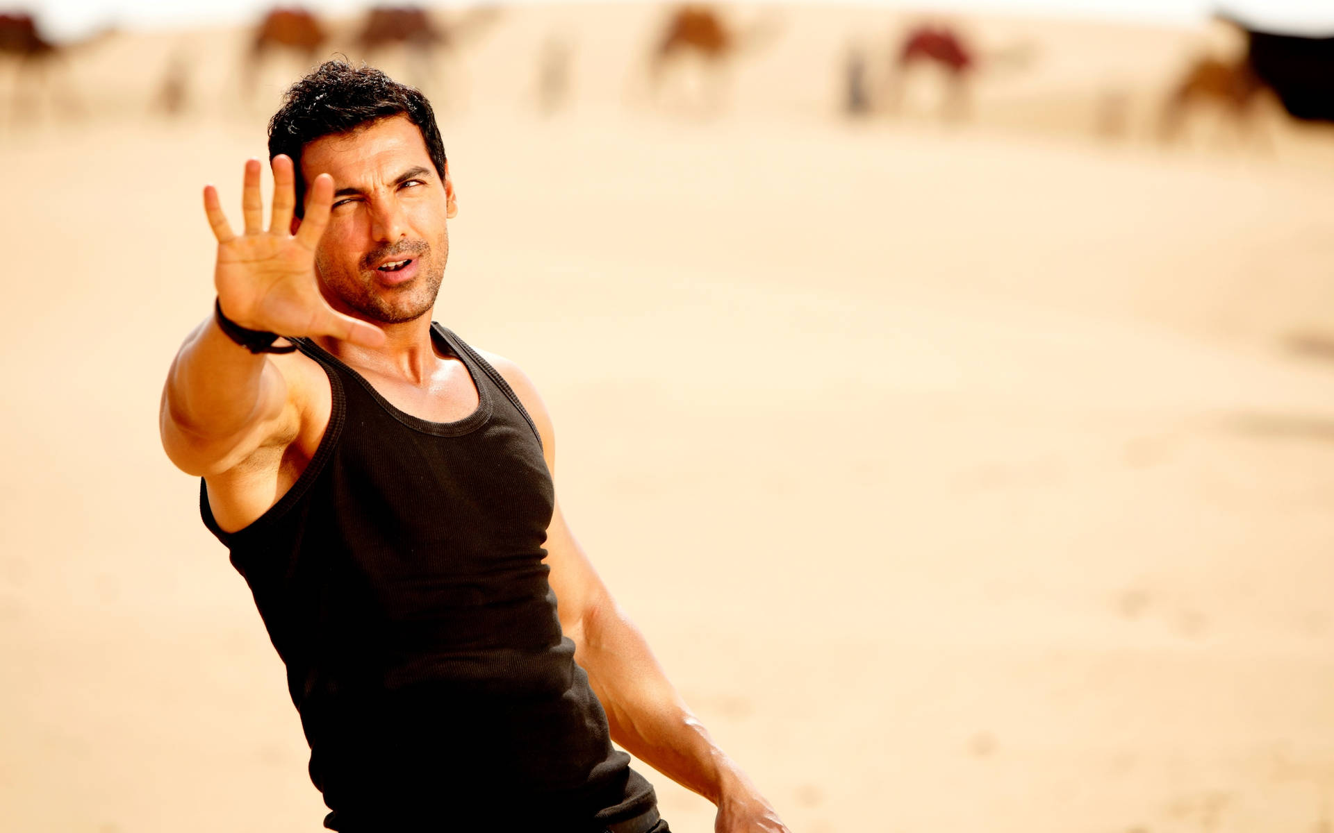 Caption: Handsome Bollywood Superstar John Abraham Looking Radiantly Confident Background