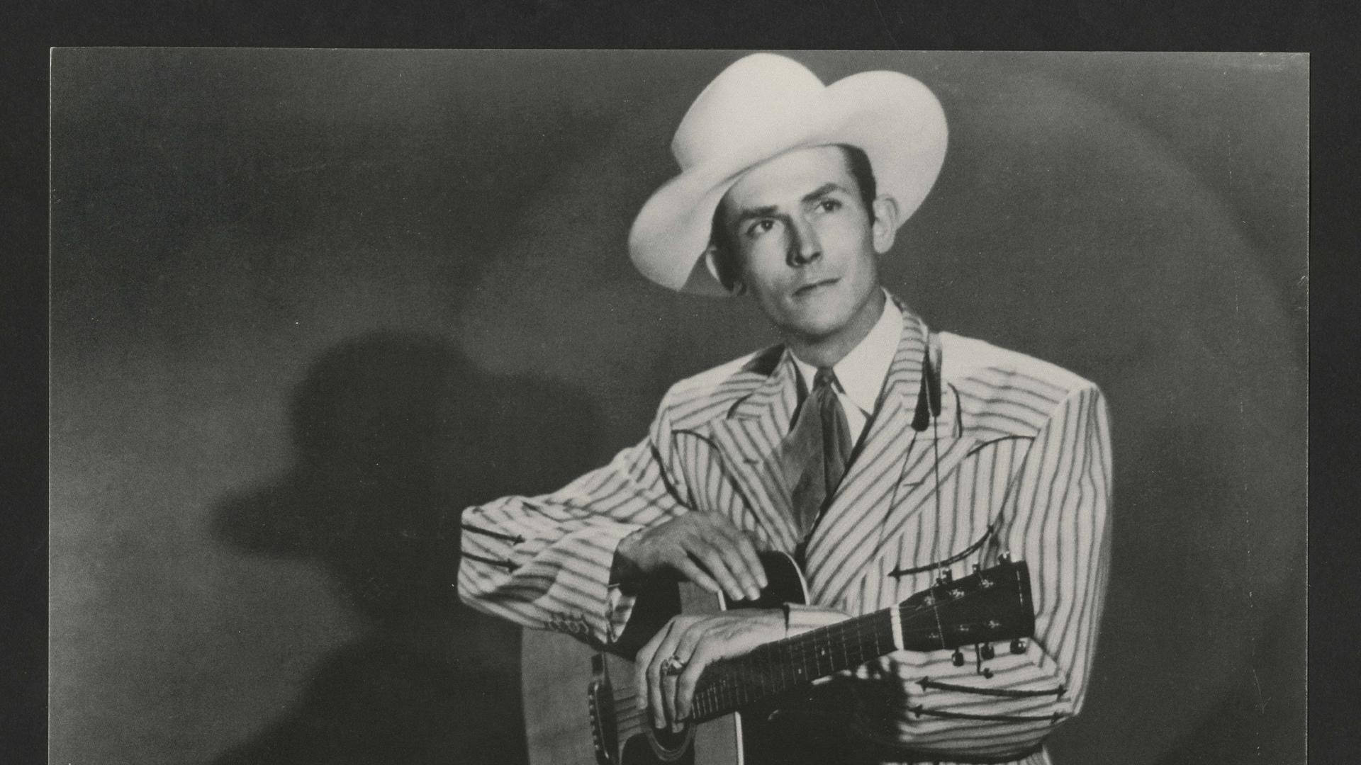 Caption: Hank Williams At The Rock And Roll Hall Of Fame Background