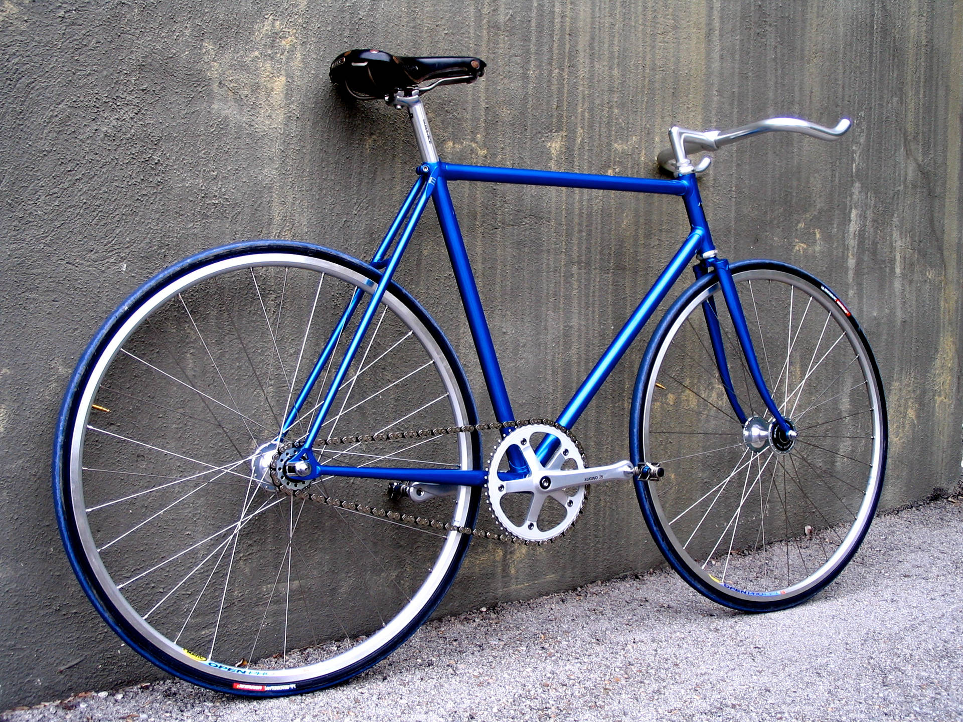 Caption: High Glossy Blue Mountain Bike, Ready For Adventure