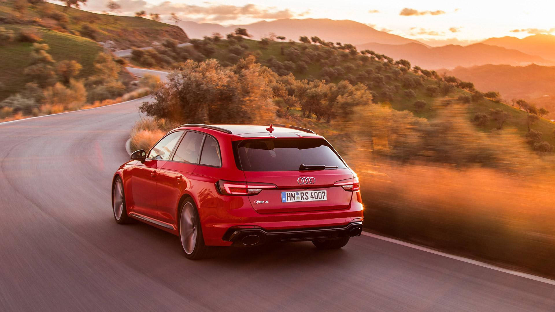 Caption: High-resolution Audi Rs 4 Amid The Winding Trees Background