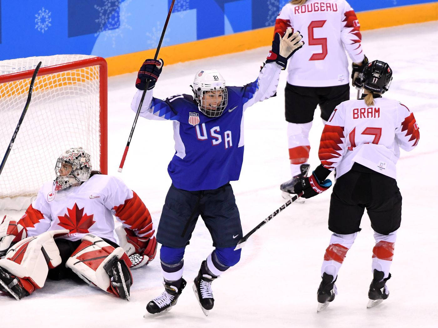 Caption: Hilary Knight In Action During An Olympic Game Background