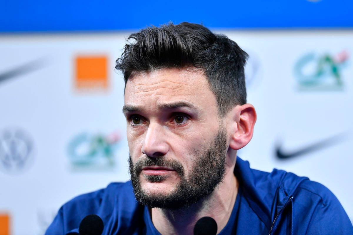 Caption: Hugo Lloris Engaged In An Interview Background