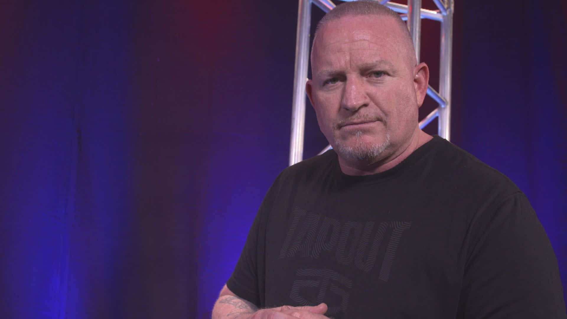 Caption: Iconic American Wrestler Road Dogg Background