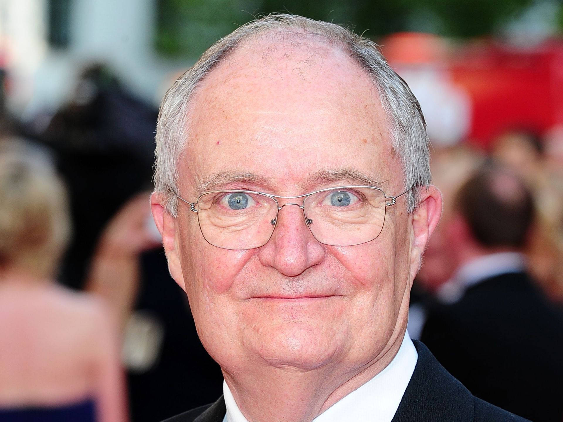 Caption: Iconic British Actor Jim Broadbent Background