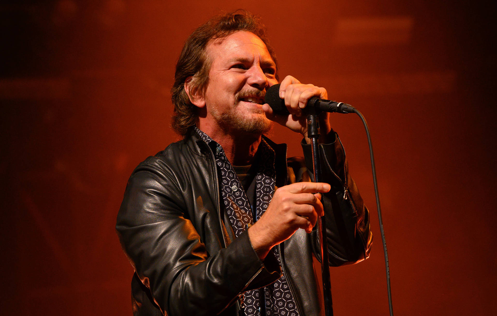 Caption: Iconic Pearl Jam's Lead Vocalist, Eddie Vedder In Live Rock Band Performance