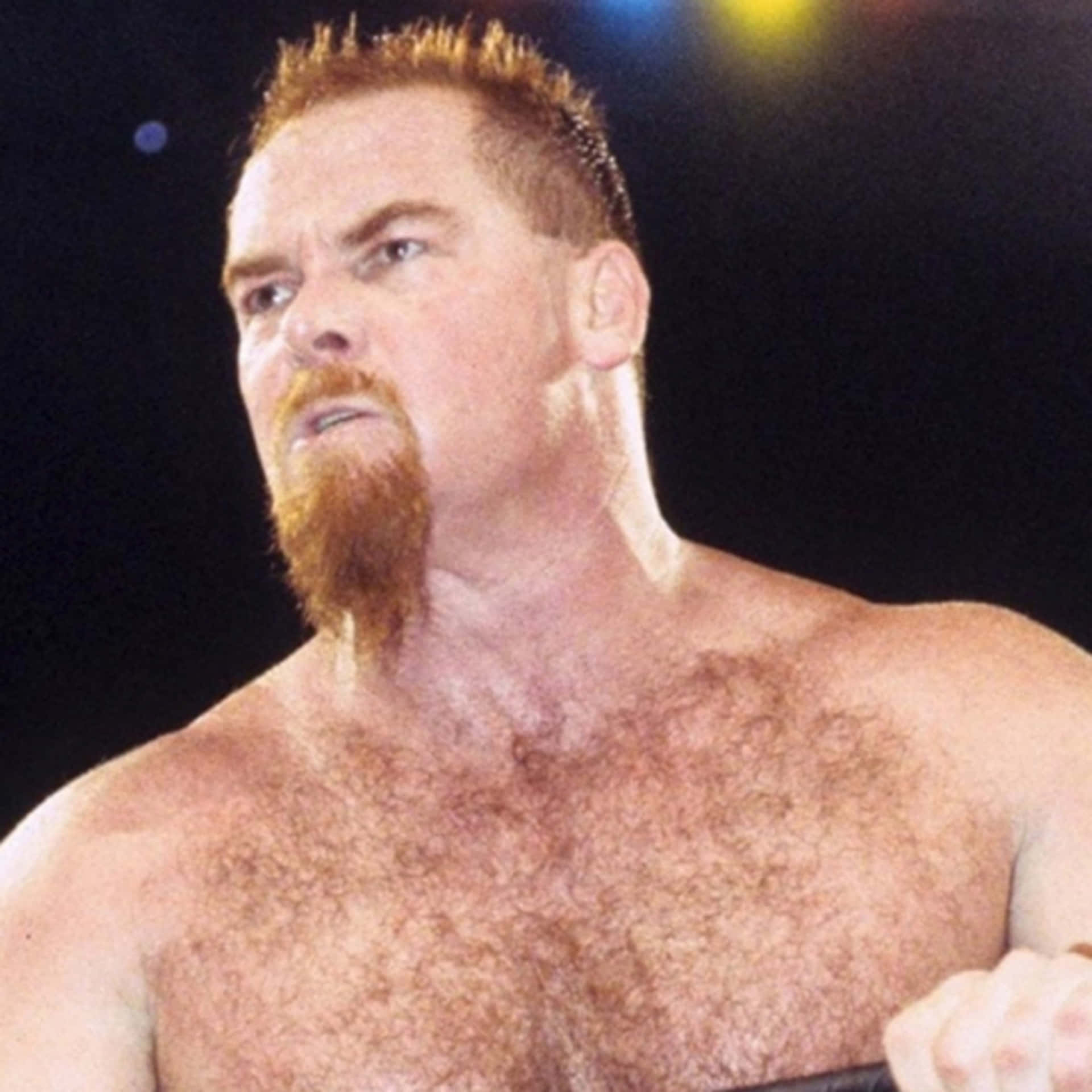 Caption: Iconic Portrait Of Wrestling Legend, Jim Neidhart Background