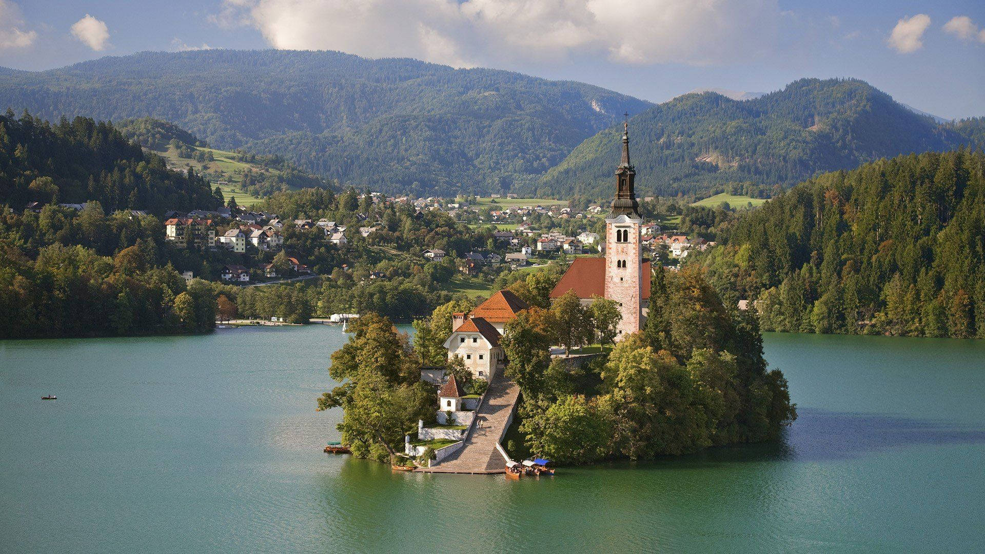Caption: Idyllic Scene Of Lake Bled In Slovenia Background