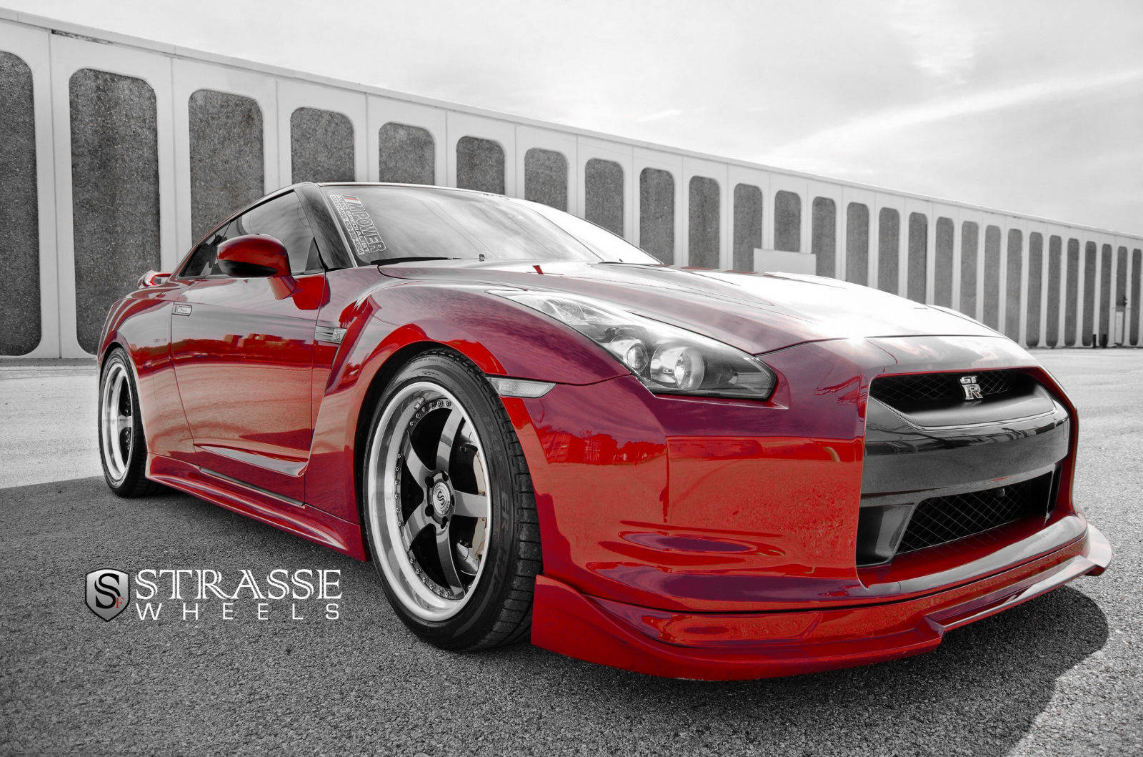 Caption: Immaculate Nissan Skyline Gt-r R35 In Stunning Red Background