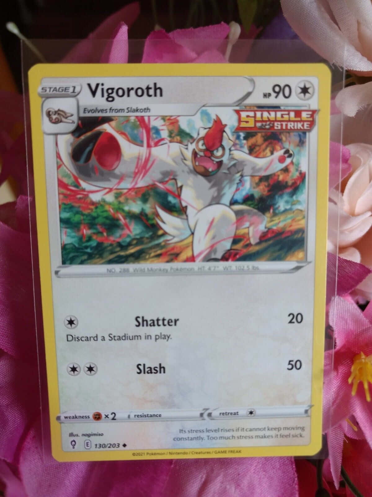 Caption: Intense Action Featuring Vigoroth Pokemon Card Background