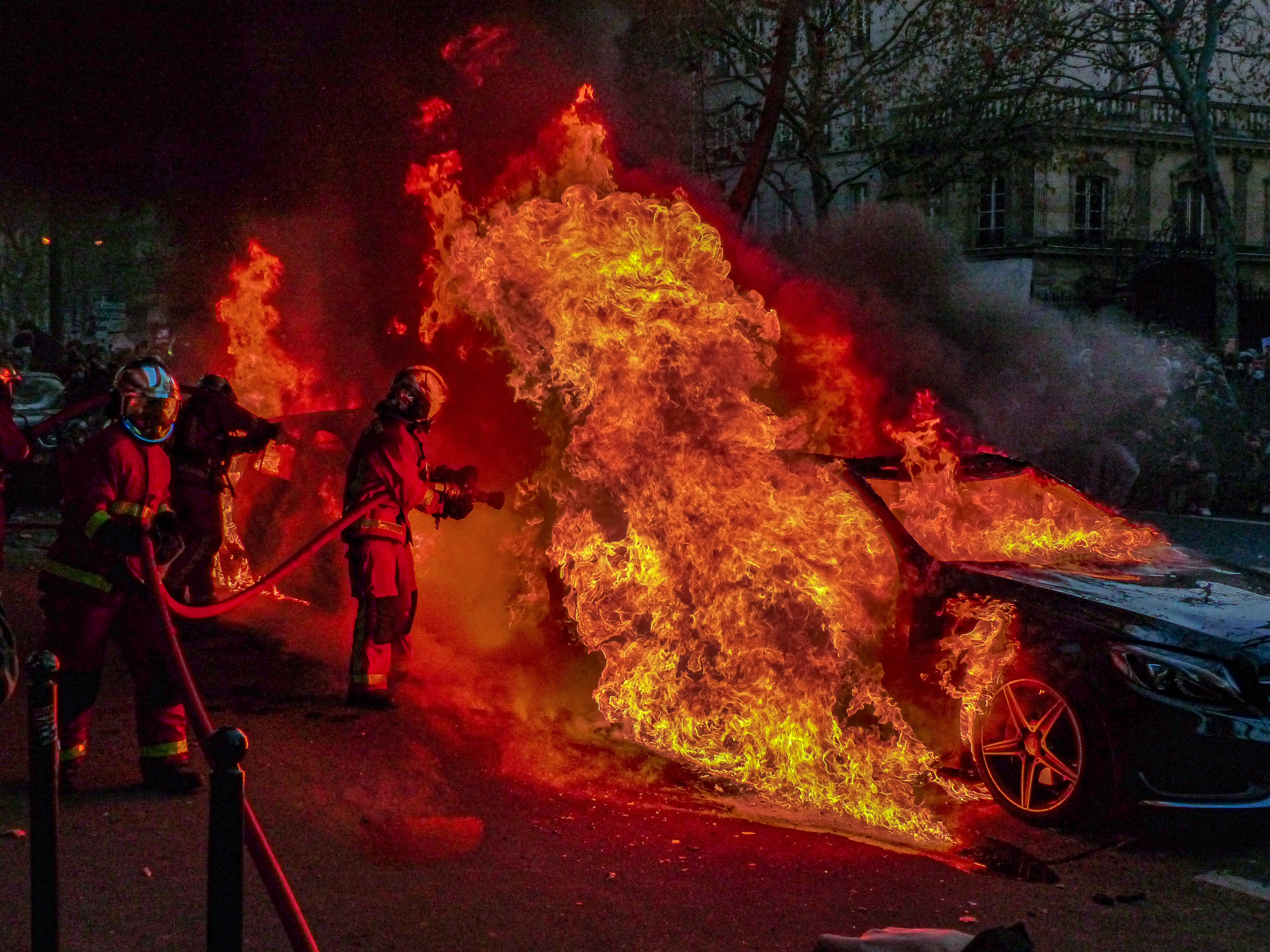 Caption: Intense Car Accident Scene On A City Street Background