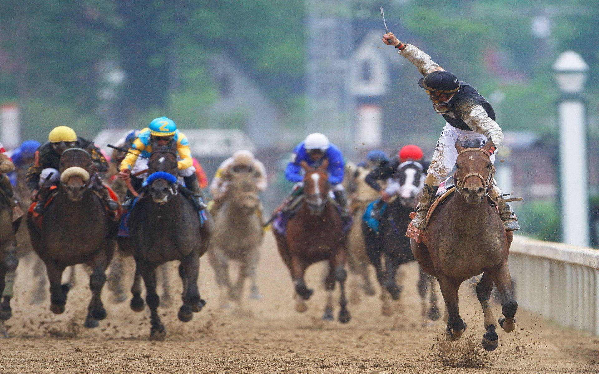 Caption: Intense Horse Racing On A Muddy Track