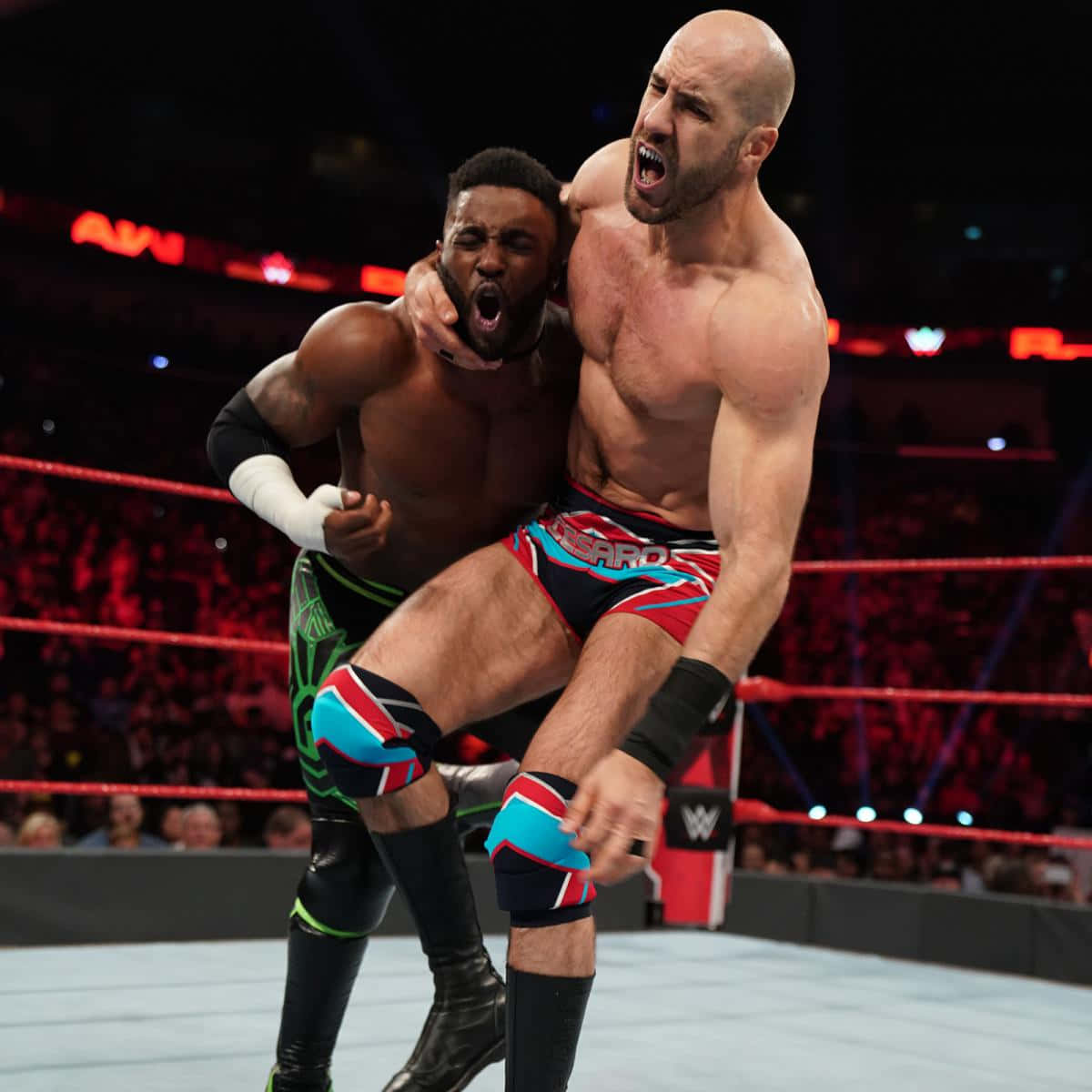 Caption: Intense Matchup - Cedric Alexander Versus Cesaro In Raw. Background