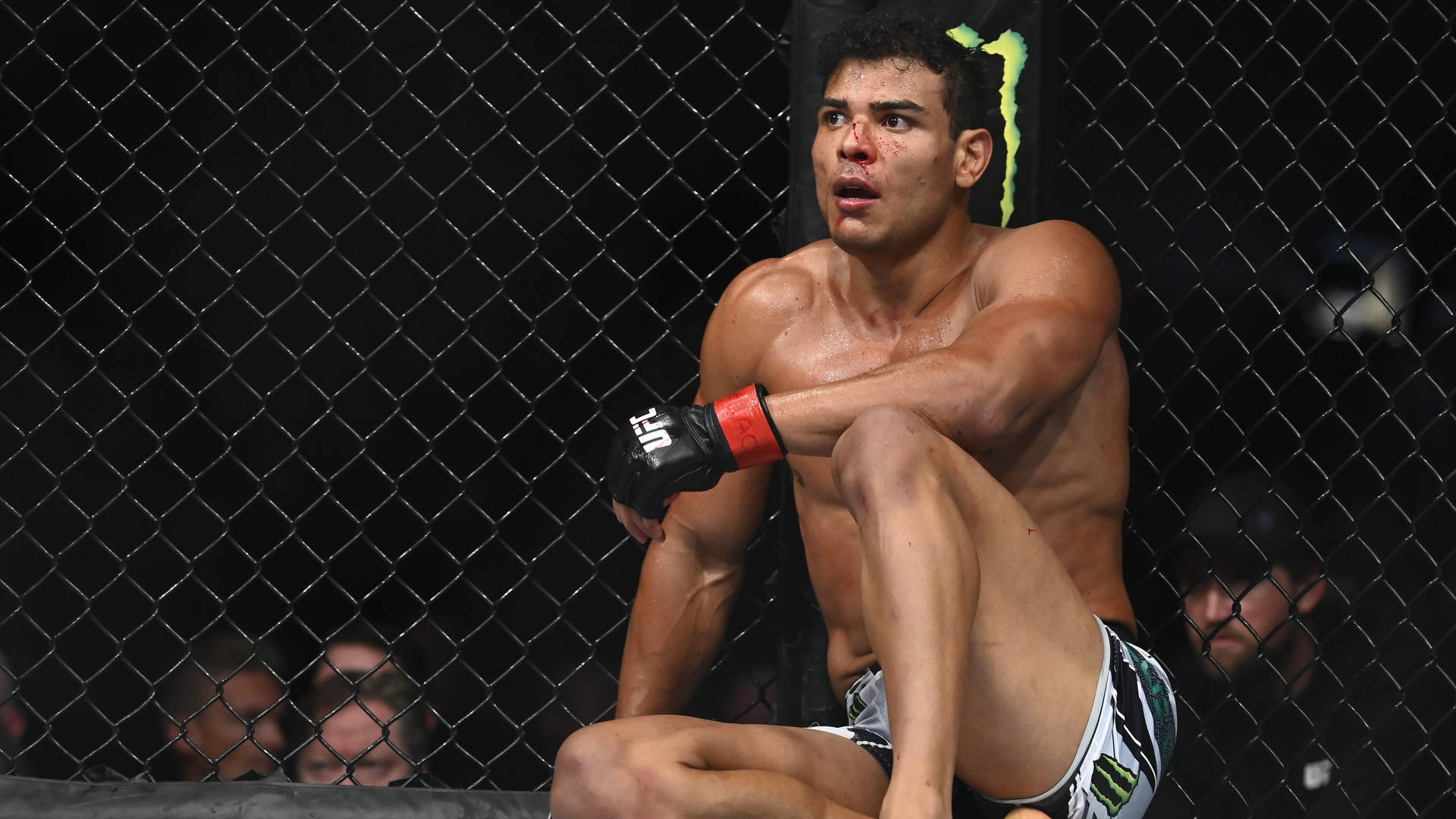 Caption: Intense Post Fight Moment With Paulo Costa Background