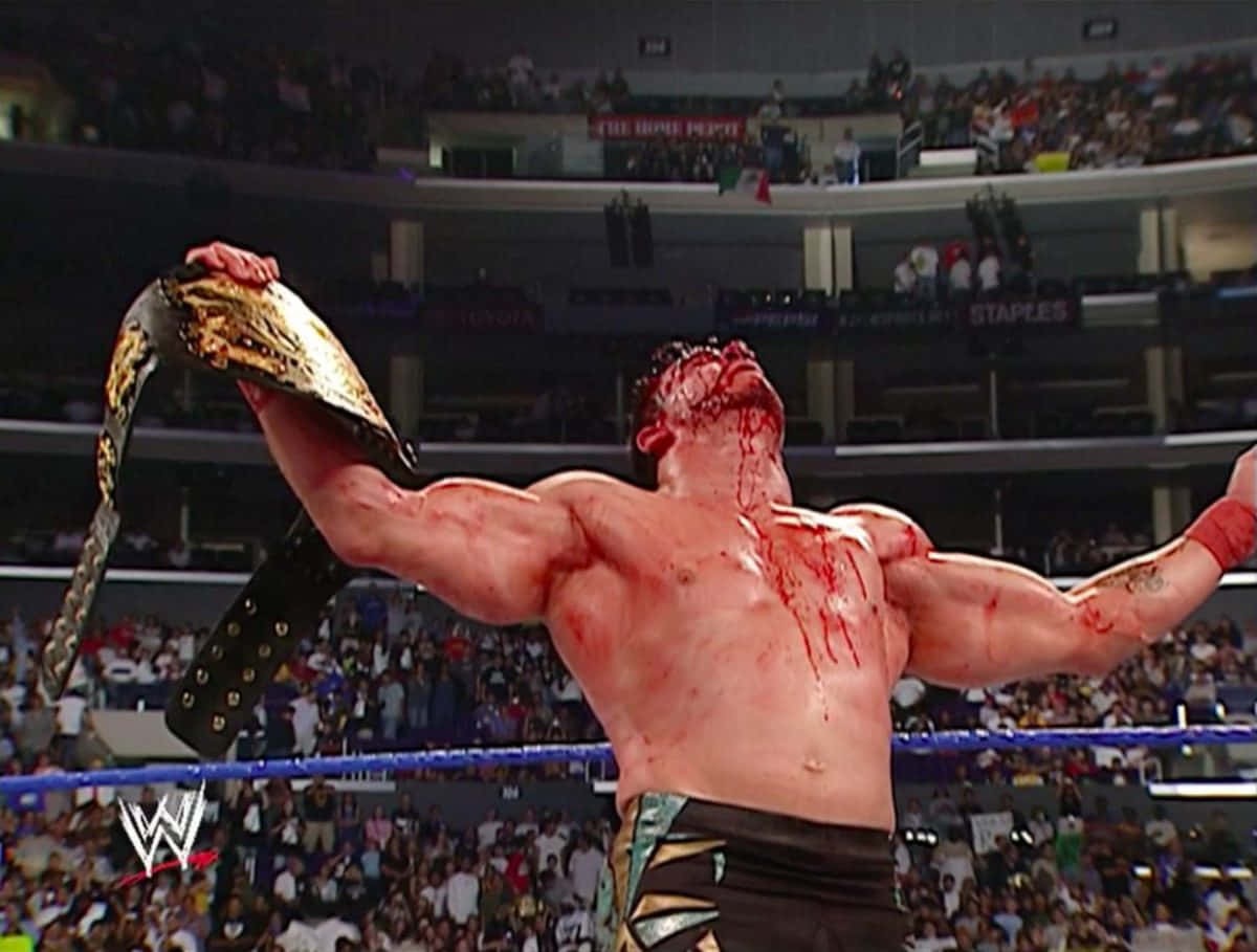 Caption: Intense Showdown - John Bradshaw Layfield Background