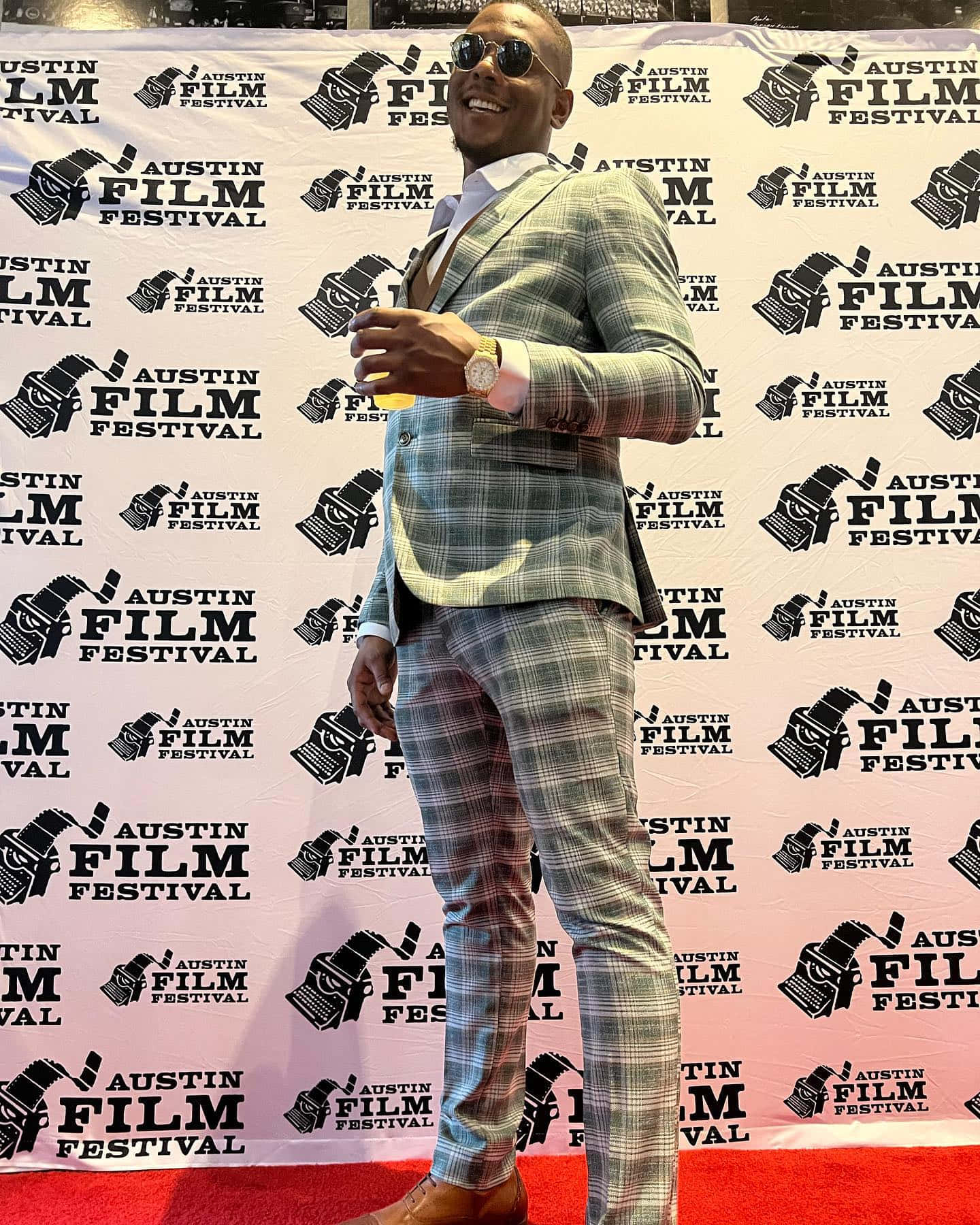 Caption: Jamahal Hill Poses At Austin Film Festival Background